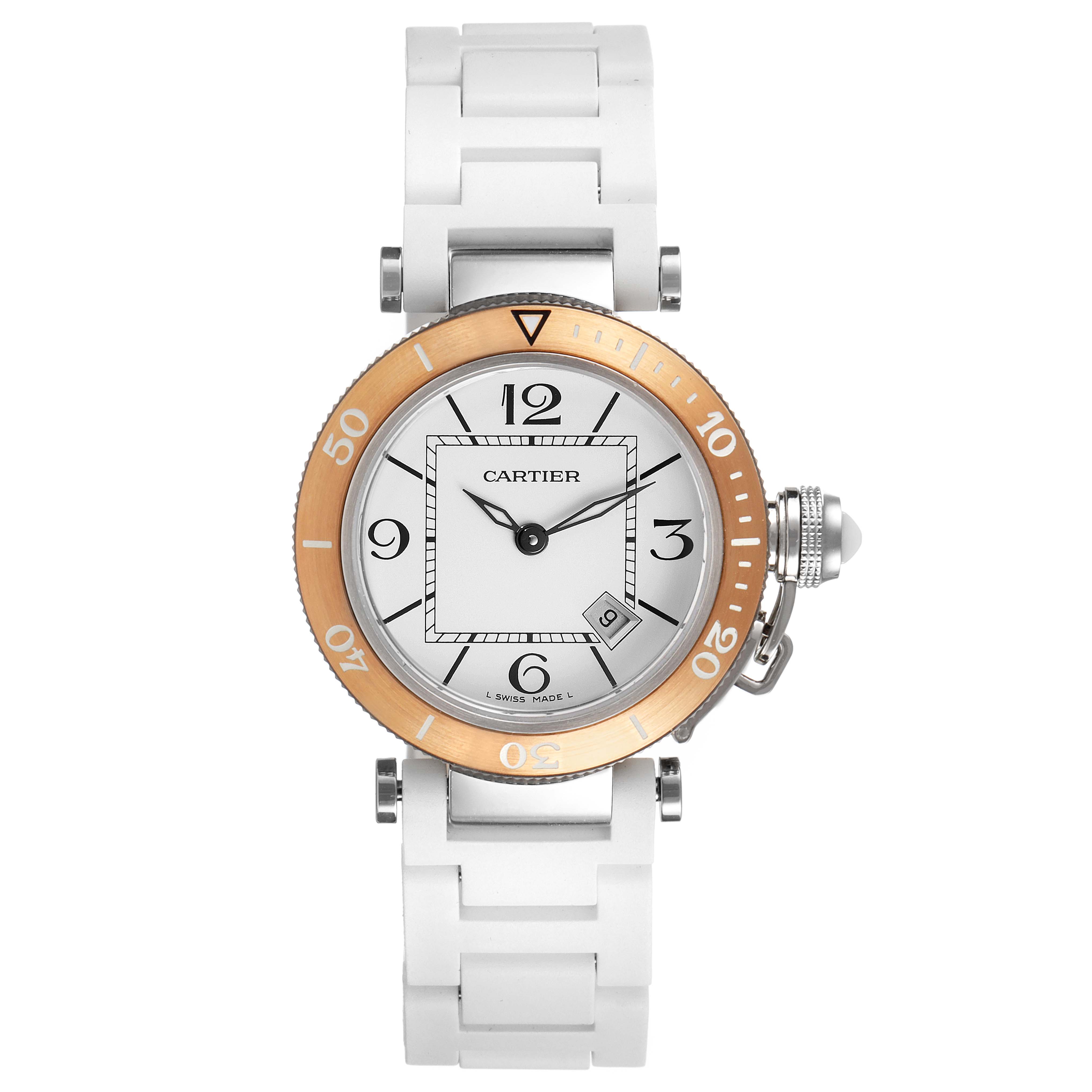 The image shows a front view of a Cartier Pasha W3140001 Women's Stainless Steel Silver Dial W3140001 Women's Stainless Steel Silver Dial watch featuring a white band and a gold bezel.