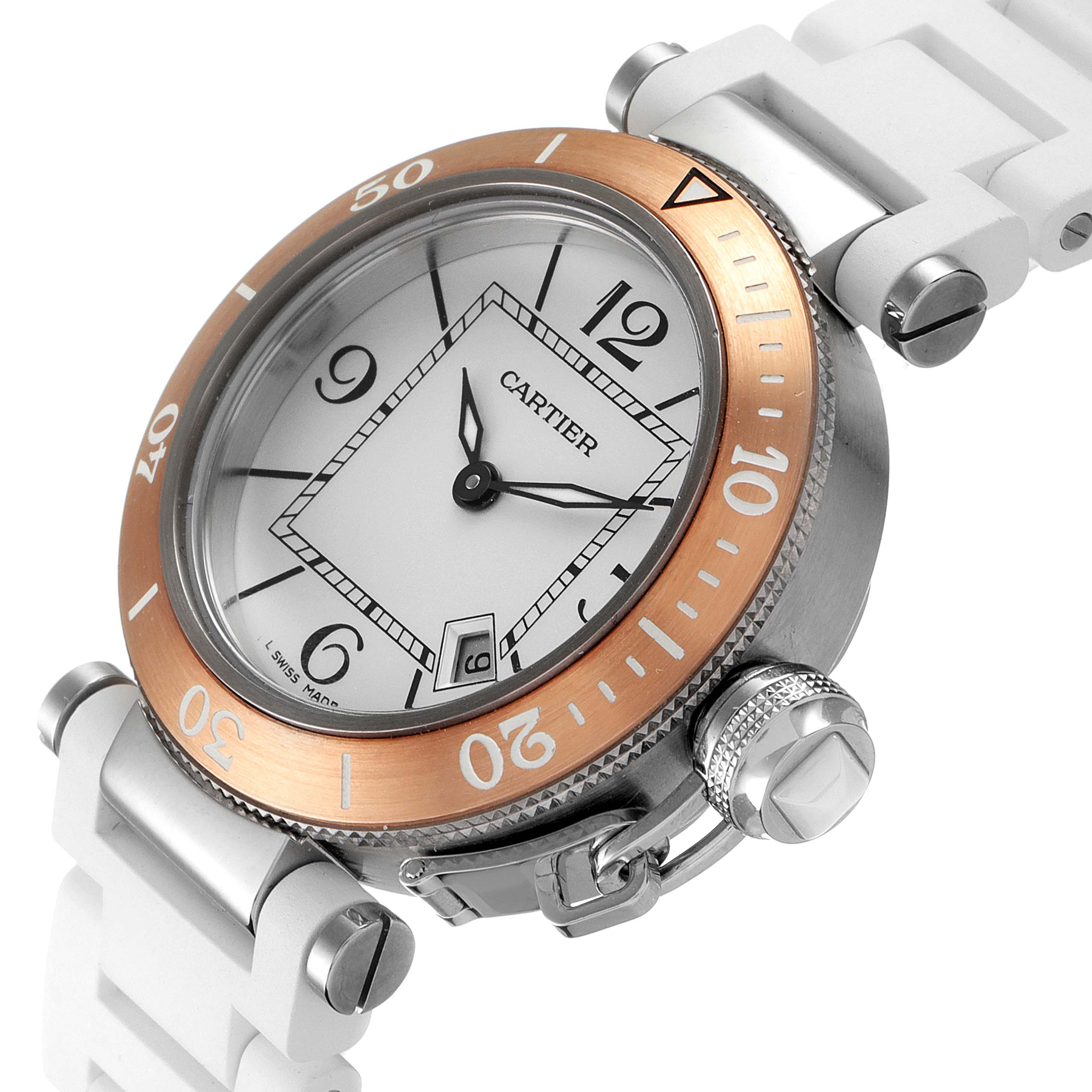 The Cartier Pasha W3140001 Women's Stainless Steel Silver Dial W3140001 Women's Stainless Steel Silver Dial watch is shown at a slight angle, highlighting its face, bezel, crown, and part of its white strap.