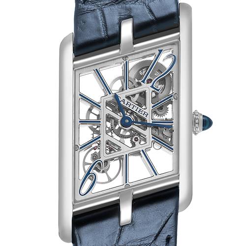 The Cartier Tank Asymetrique WHTA0012 Men's Platinum Transparent Dial is shown from a slightly tilted angle, featuring its skeletonized dial and blue leather strap.