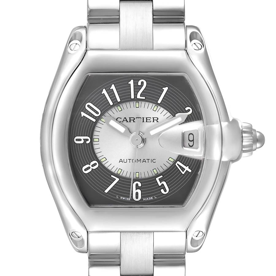 The Cartier Roadster watch is shown from a top-down angle, highlighting the silver dial, case, and bracelet.