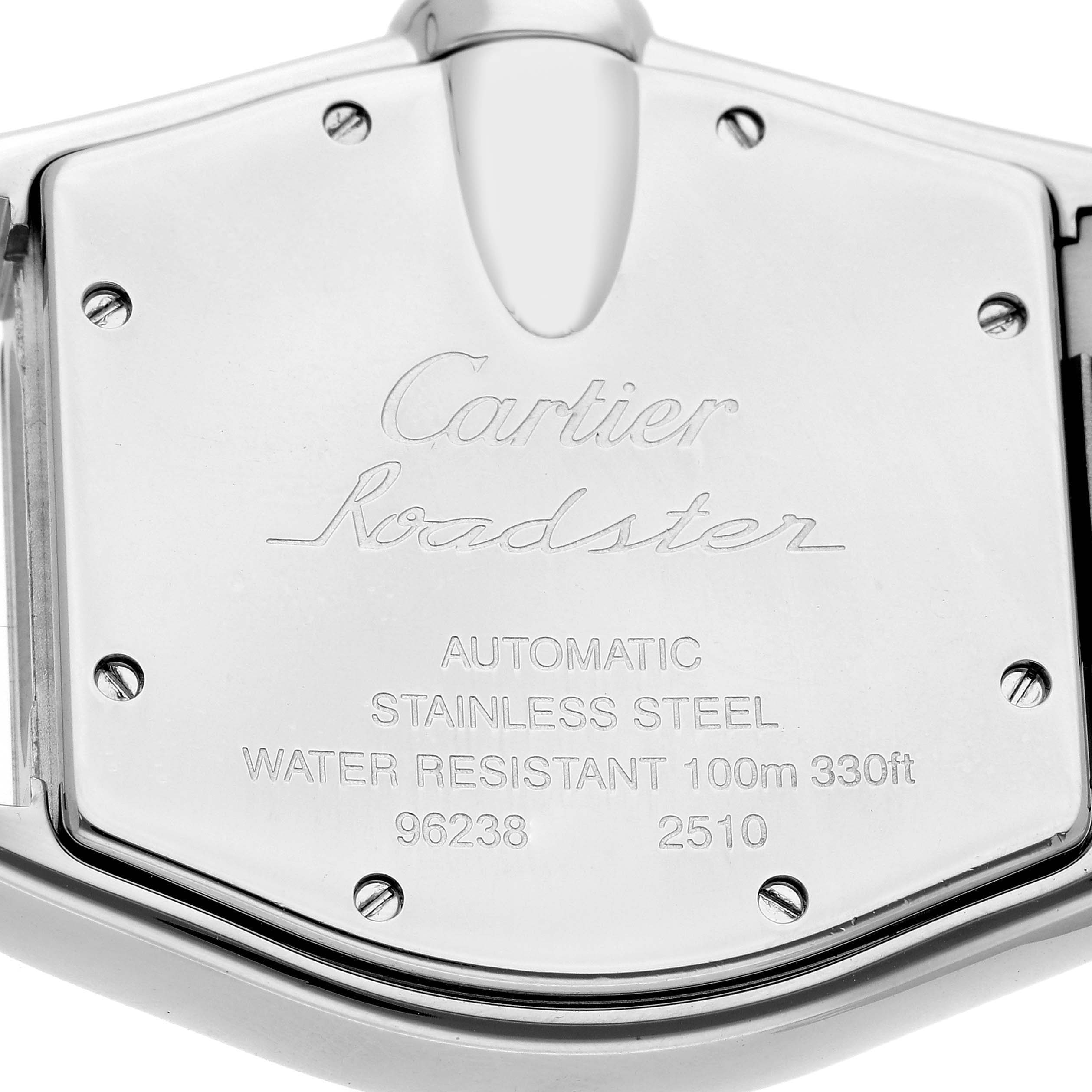 The image shows the back of the Cartier Roadster W62041V3 Men
s Stainless Steel Black Dial W62041V3 Men
s Stainless Steel Black Dial watch, highlighting engravings and screws.