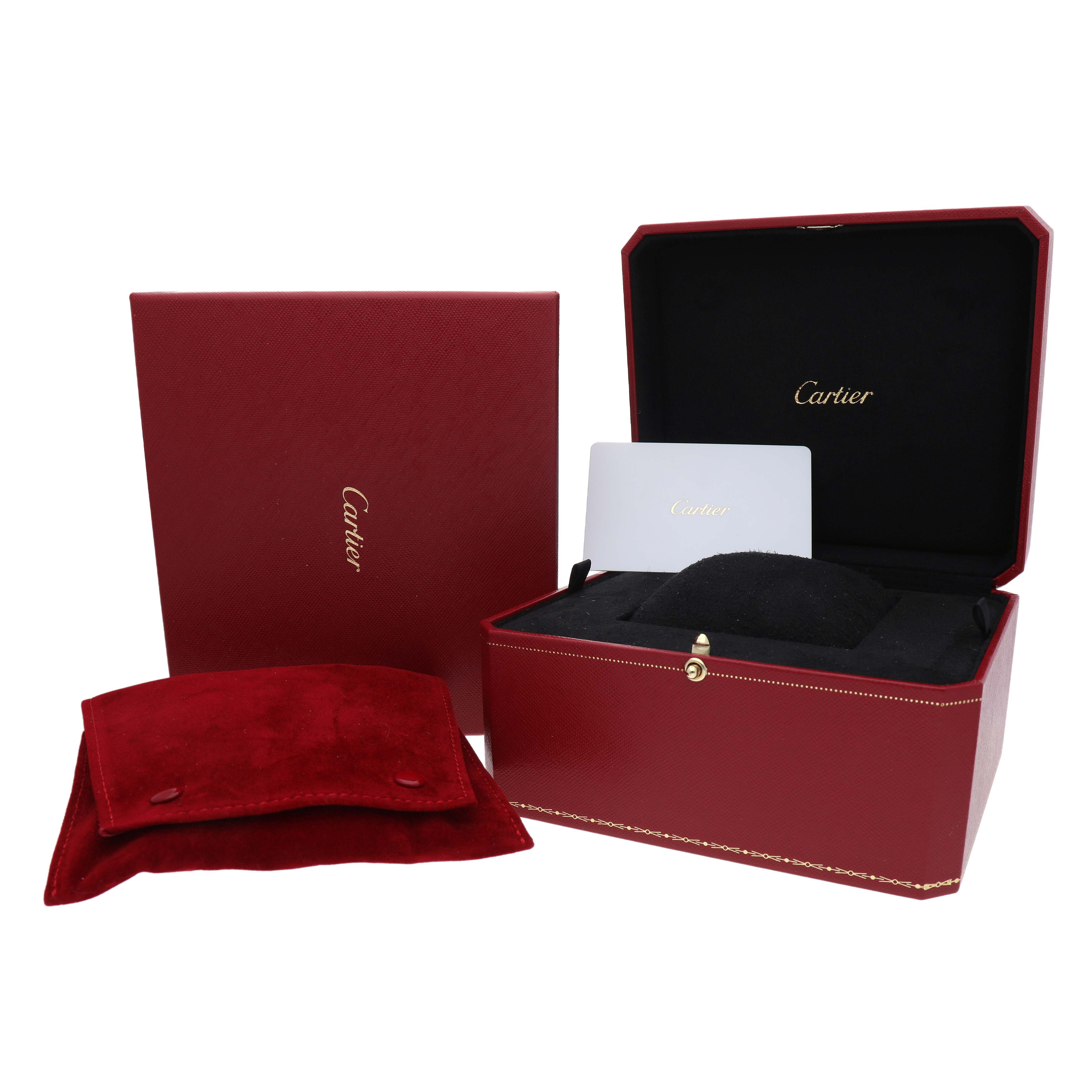 The image shows a Cartier Ronde WSRN0033 Women's Stainless Steel White Dial model's box set, including a red case, a pouch, and a card.