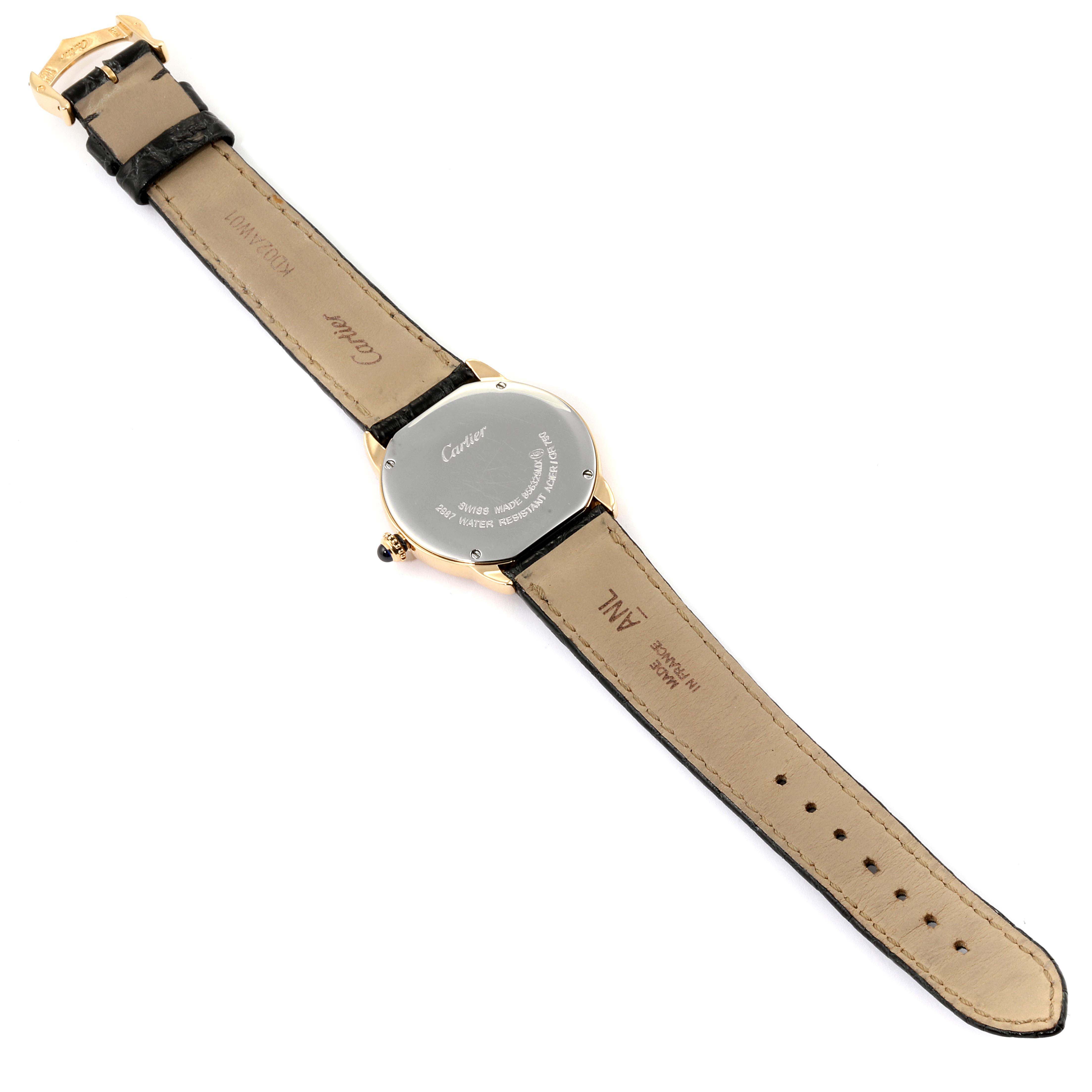 The image shows the back case and leather strap of a Cartier Ronde W6700355  Women's Yellow Gold Silver Dial W6700355  Women's Yellow Gold Silver Dial model watch.