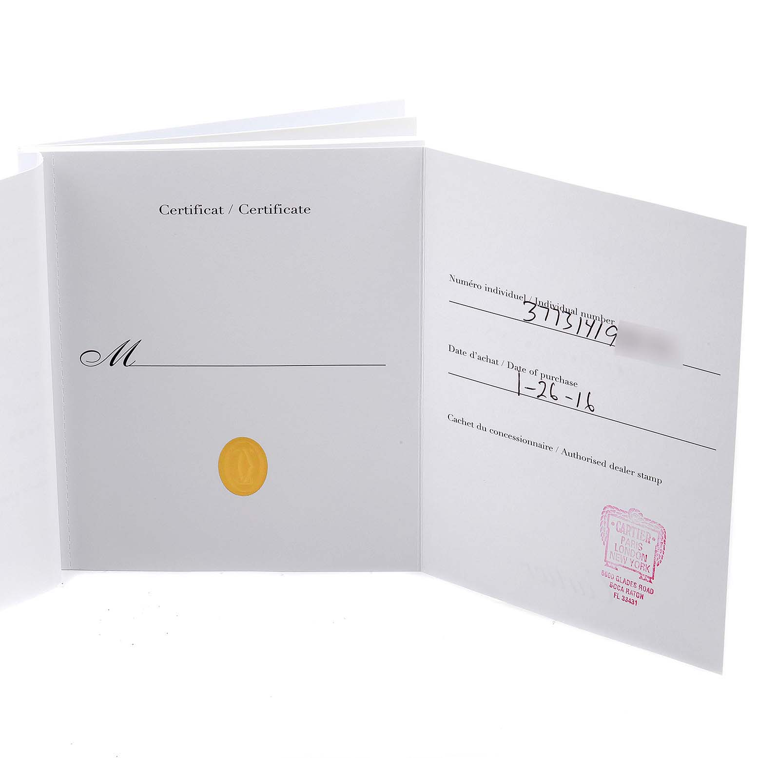 The image shows the open warranty certificate booklet for a Cartier Rotonde W6700255 Men's Stainless Steel Silver Dial W6700255 Men's Stainless Steel Silver Dial watch, displaying purchase date and dealer stamp.