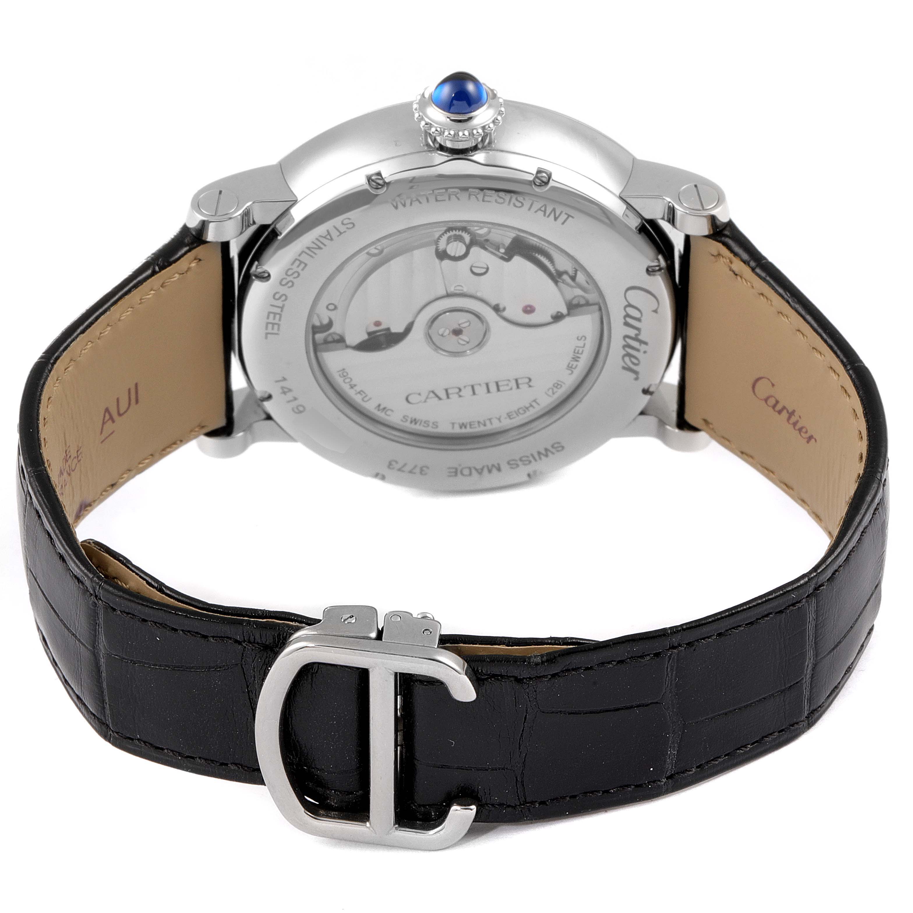 The image shows the back view of a Rotonde de Cartier watch, highlighting its transparent case back and black leather strap.