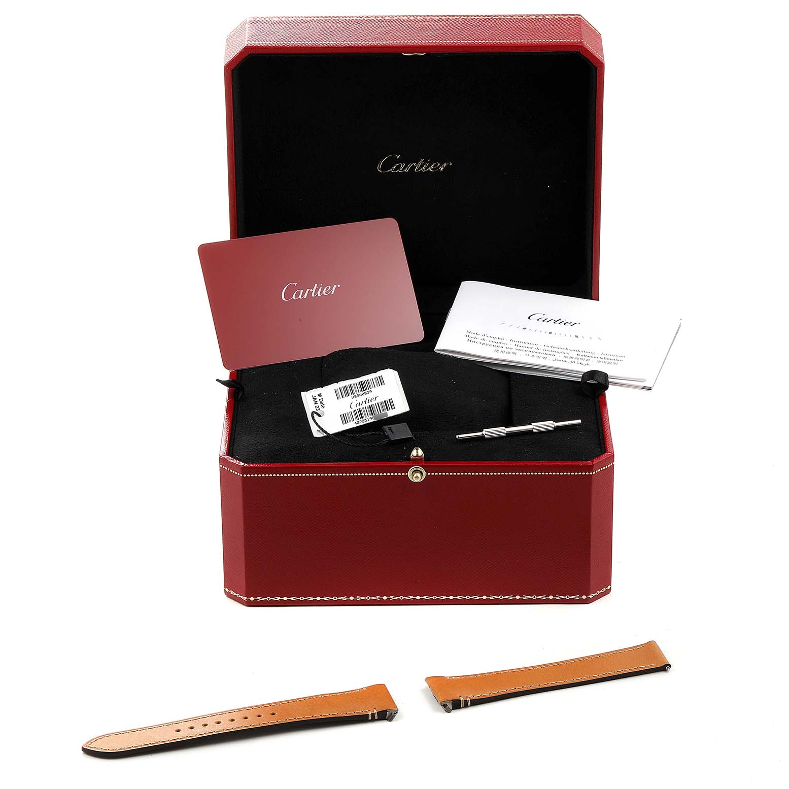 The image shows a Cartier Santos WSSA0039 Men's Stainless Steel Black Dial WSSA0039 Men's Stainless Steel Black Dial watch box containing booklets, a card, a screwdriver, and additional watch straps.