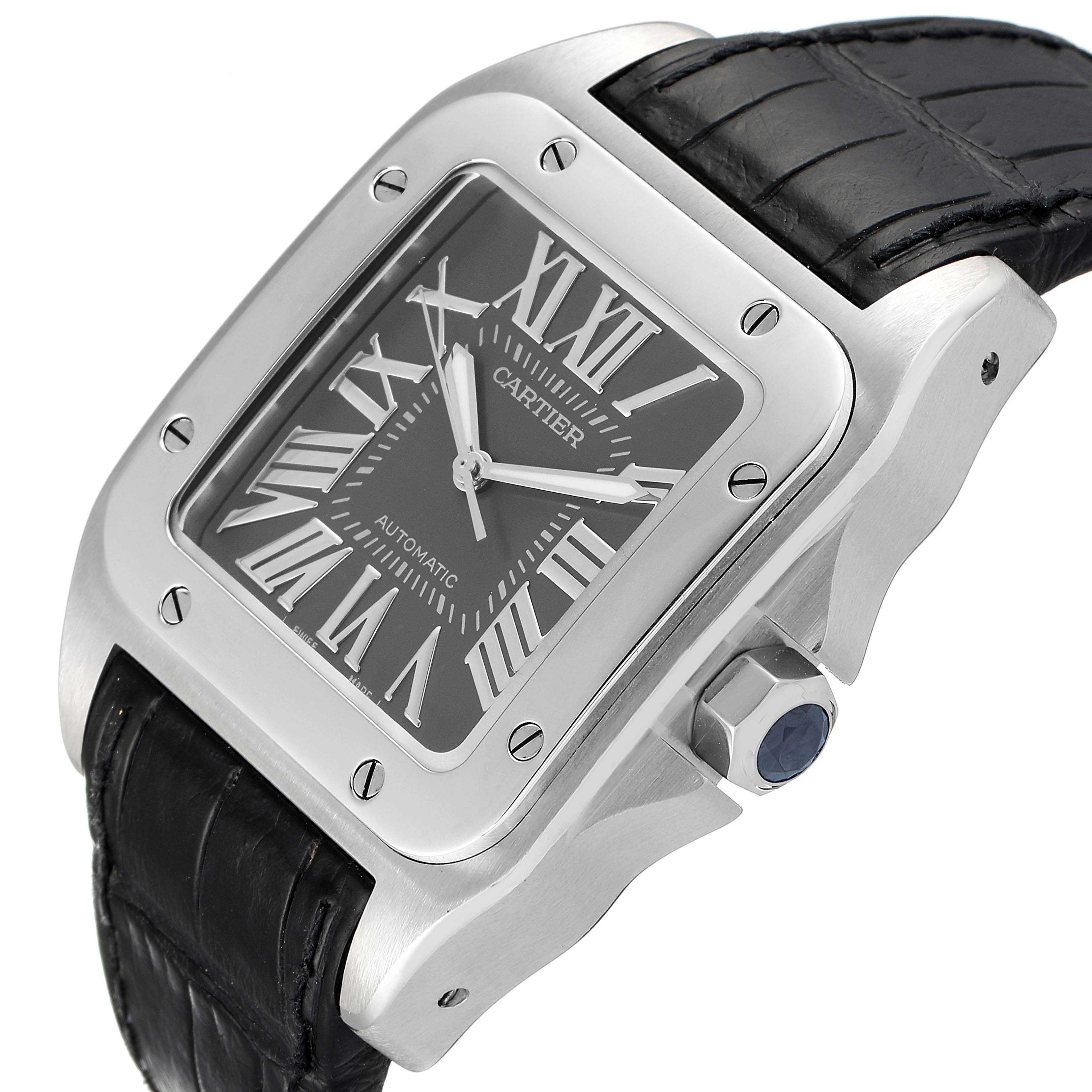 The Cartier Santos W20073X8 Men's Stainless Steel Grey Dial W20073X8 Men's Stainless Steel Grey Dial watch is shown from an angled front view, highlighting its face, bezel, and leather strap.