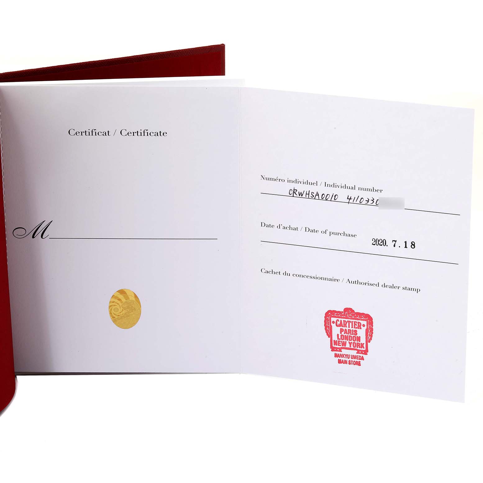 This image shows the certificate booklet opened to the warranty page for the Cartier Santos WHSA0010 Men's Rose Gold Transparent Dial WHSA0010 Men's Rose Gold Transparent Dial model watch.