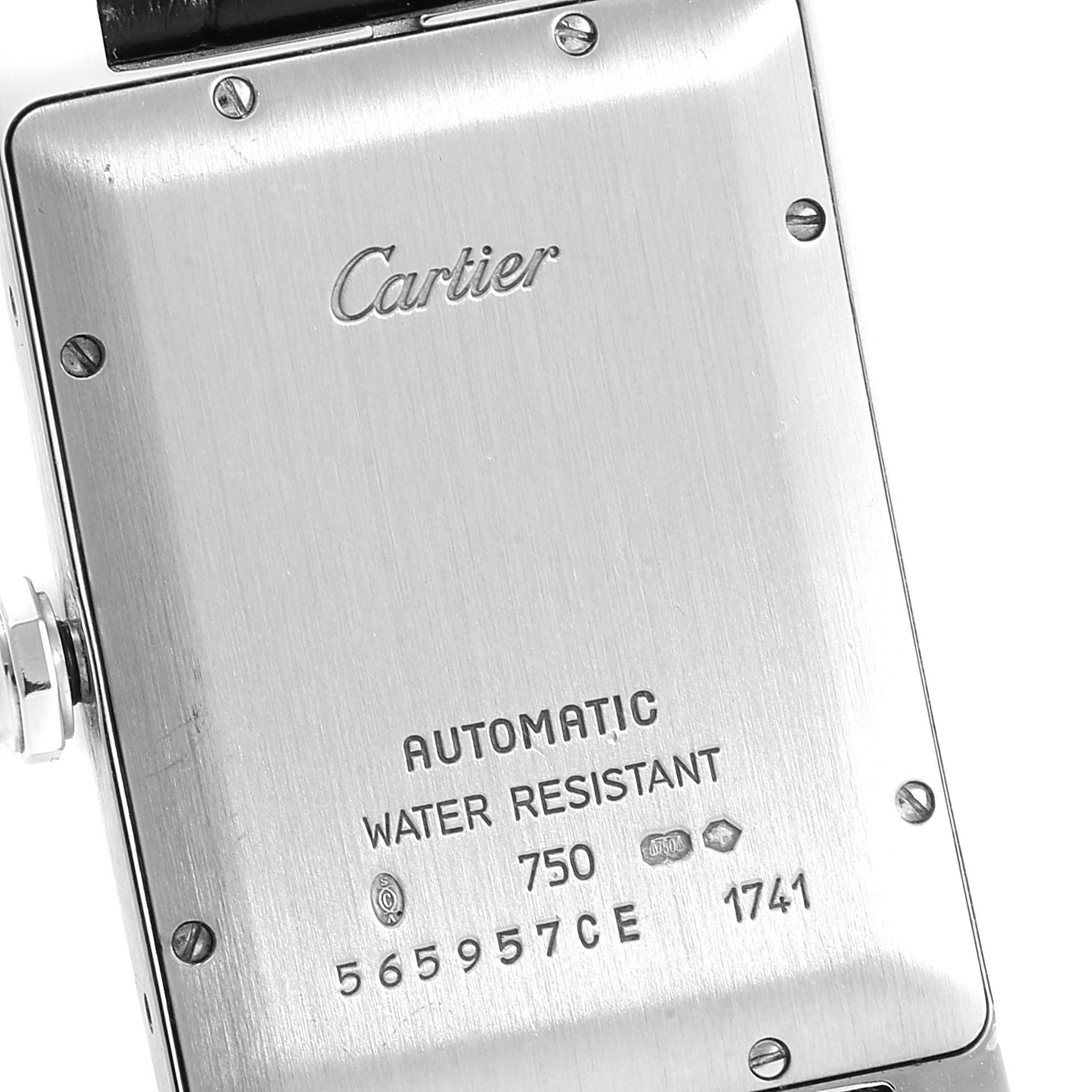 The image shows the back case of a Cartier Tank Americaine W2603256 Men's White Gold Silver Dial W2603256 Men's White Gold Silver Dial watch, displaying branding and specifications.