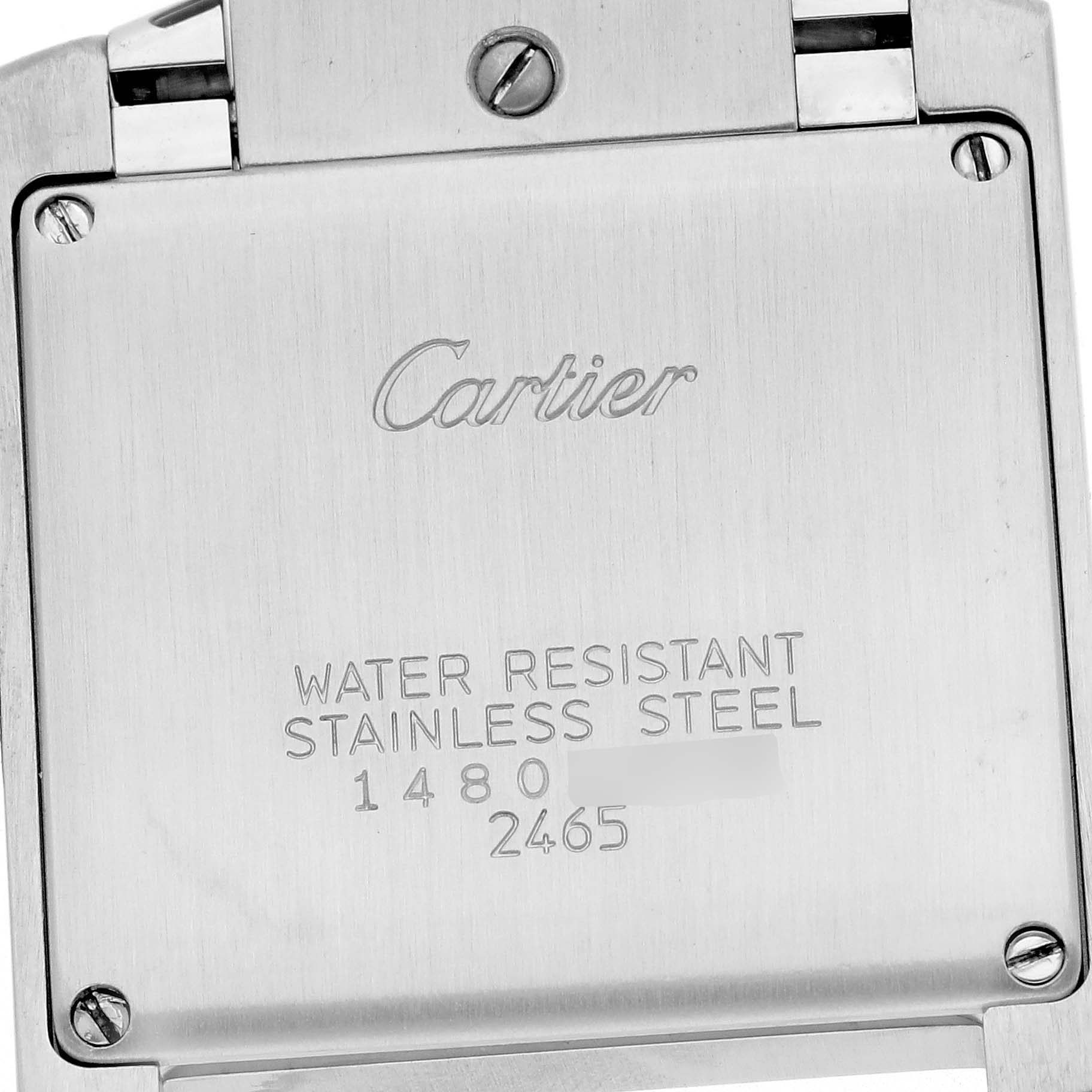 The image shows the back of a Cartier Tank Francaise W51011Q3 Women
s Stainless Steel Silver Dial W51011Q3 Women
s Stainless Steel Silver Dial watch, featuring branding and specifications engraved on the stainless steel case.