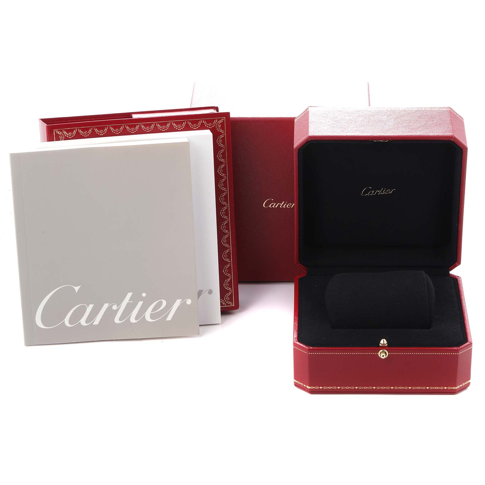 The image shows a Cartier Tank Française watch box, open with a black cushion, along with packaging and a booklet.