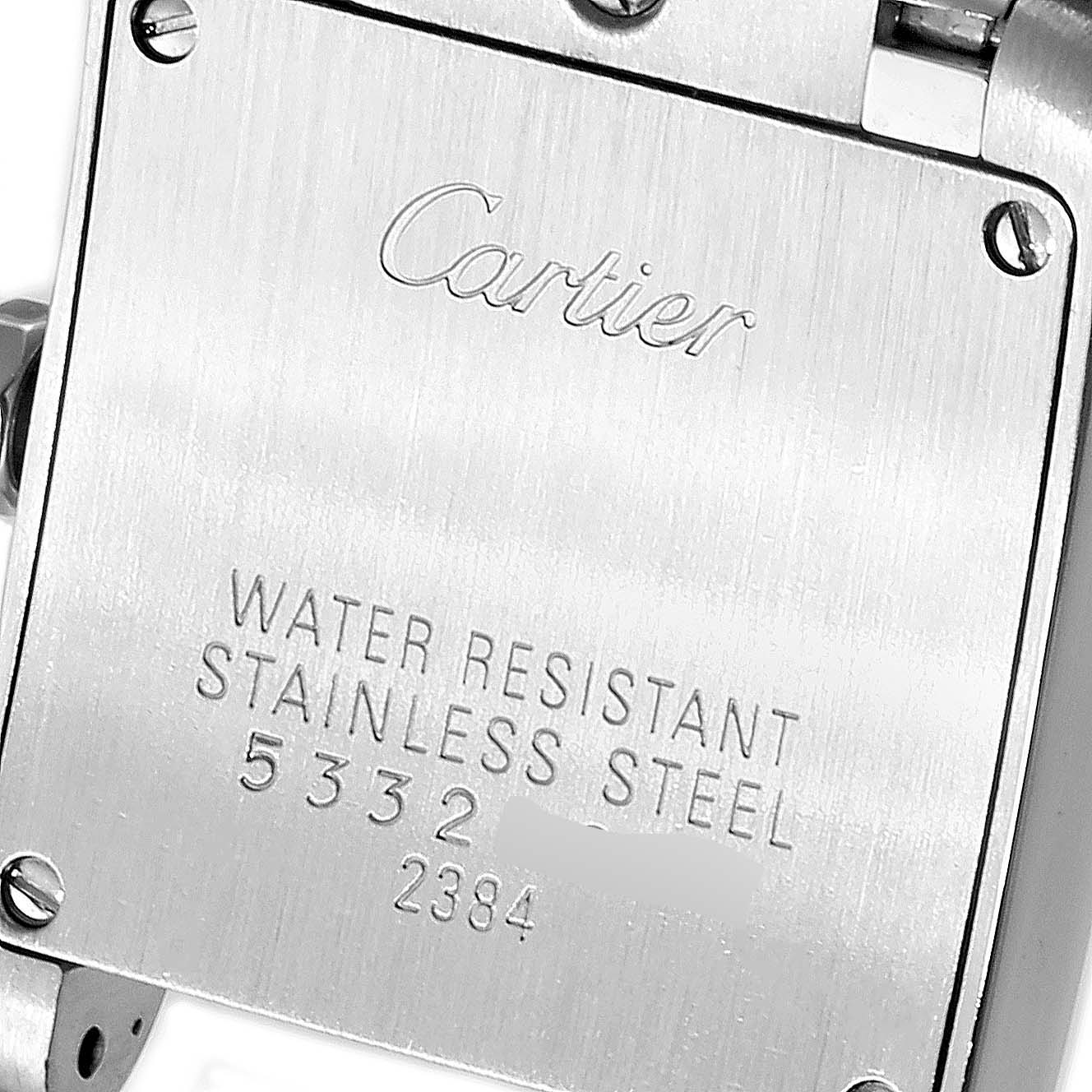 This image shows the back case of a Cartier Tank Française watch, highlighting its water resistance and stainless steel material.