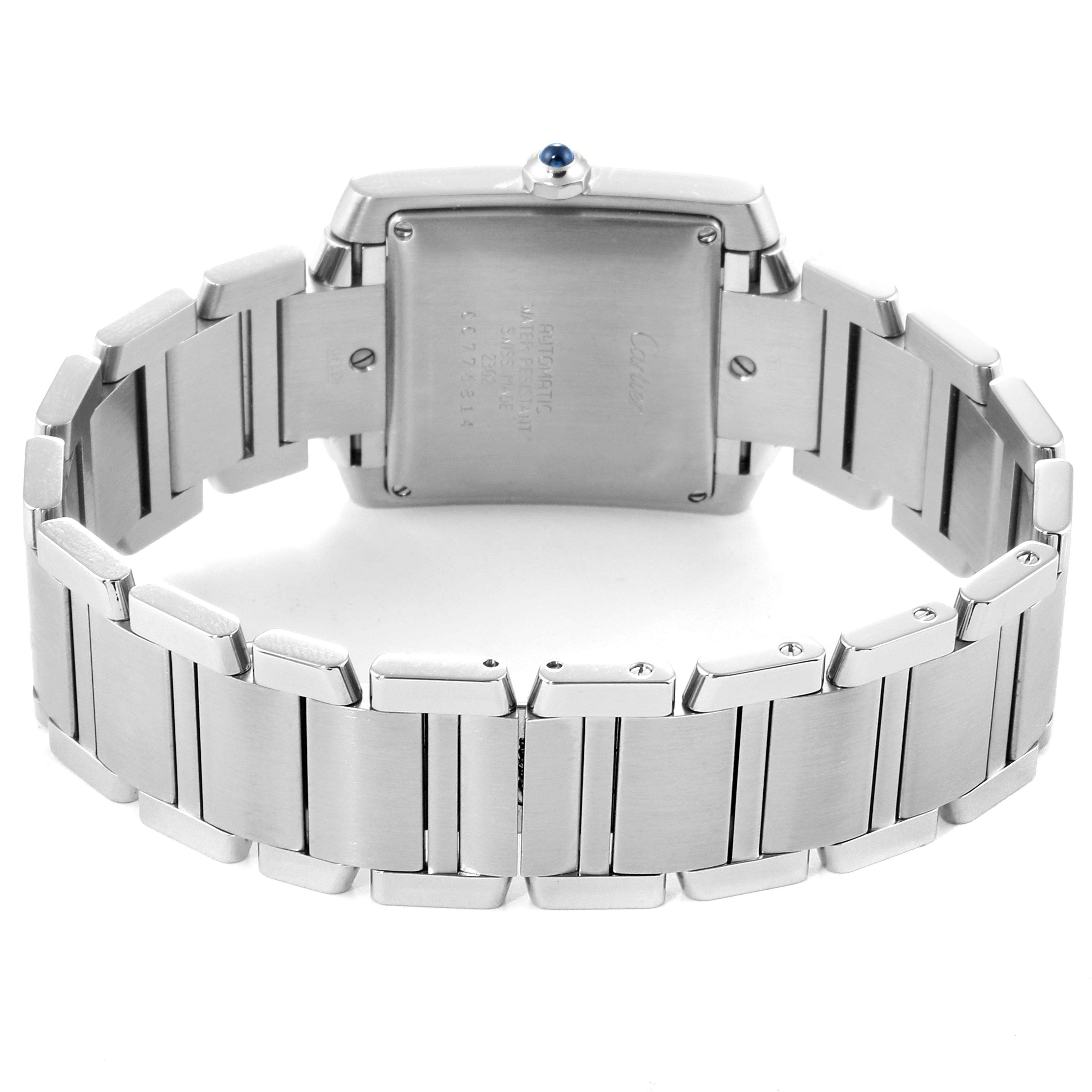 The image shows the back view of a Cartier Tank Française watch, highlighting its case back, bracelet, and clasp.