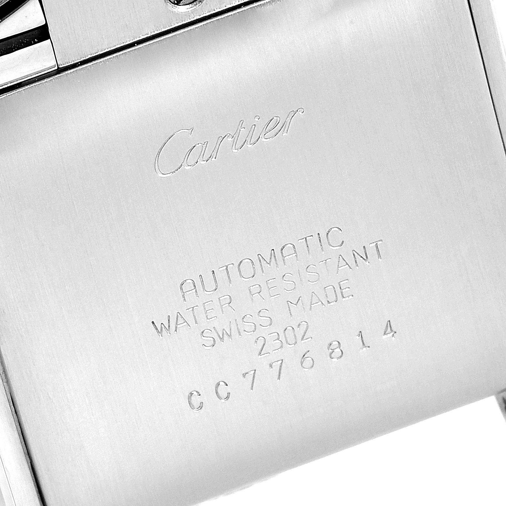 This image shows the back casing of a Cartier Tank Francaise W51002Q3 Men's Stainless Steel Silver Dial W51002Q3 Men's Stainless Steel Silver Dial watch, displaying the brand name and watch specifications.