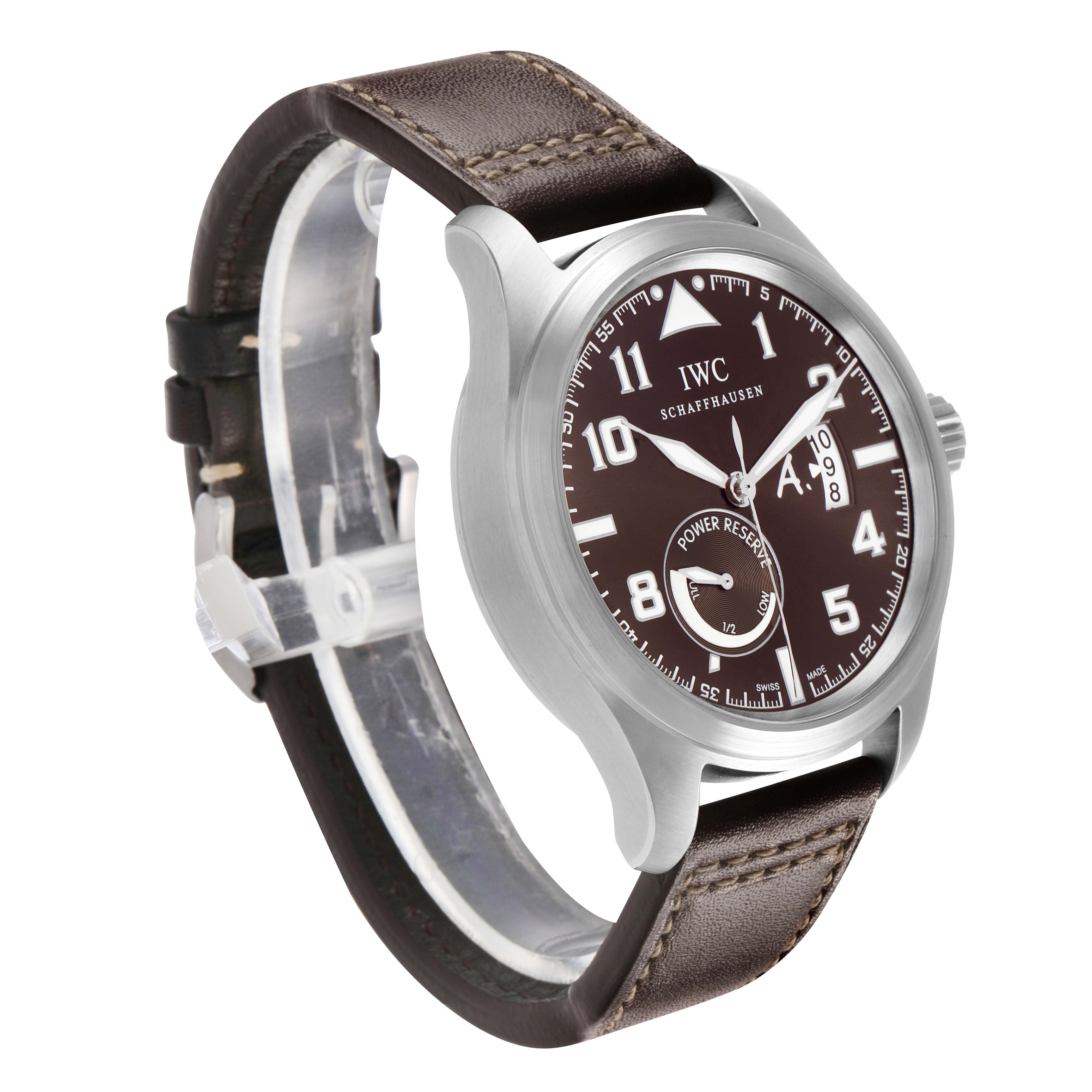 The IWC Pilot IW320104 Men's Stainless Steel Brown Dial model watch is shown at an oblique angle, highlighting its face, bezel, and leather strap.
