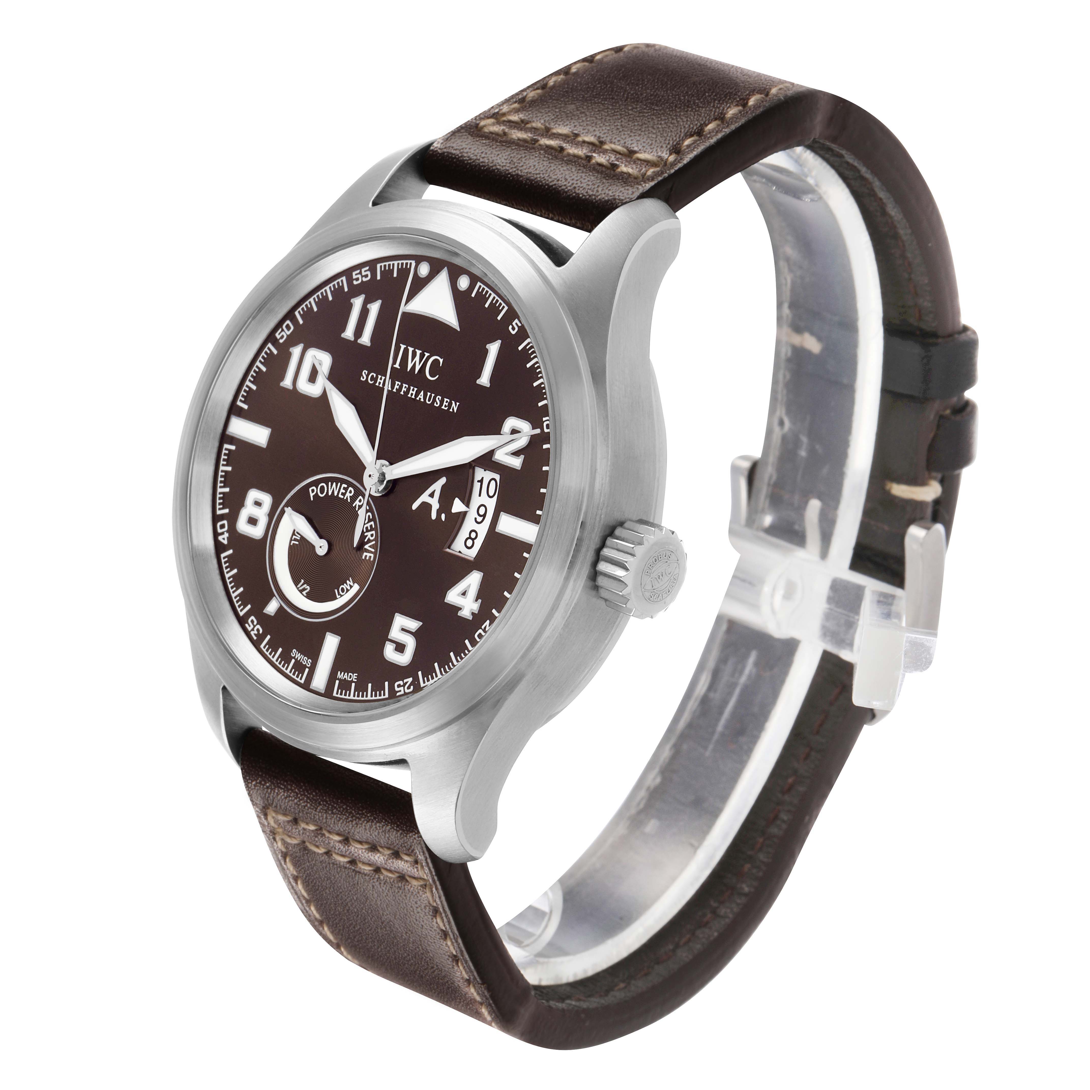 The IWC Pilot IW320104 Men's Stainless Steel Brown Dial watch is shown at a three-quarter angle, featuring its dial, crown, and brown leather strap.
