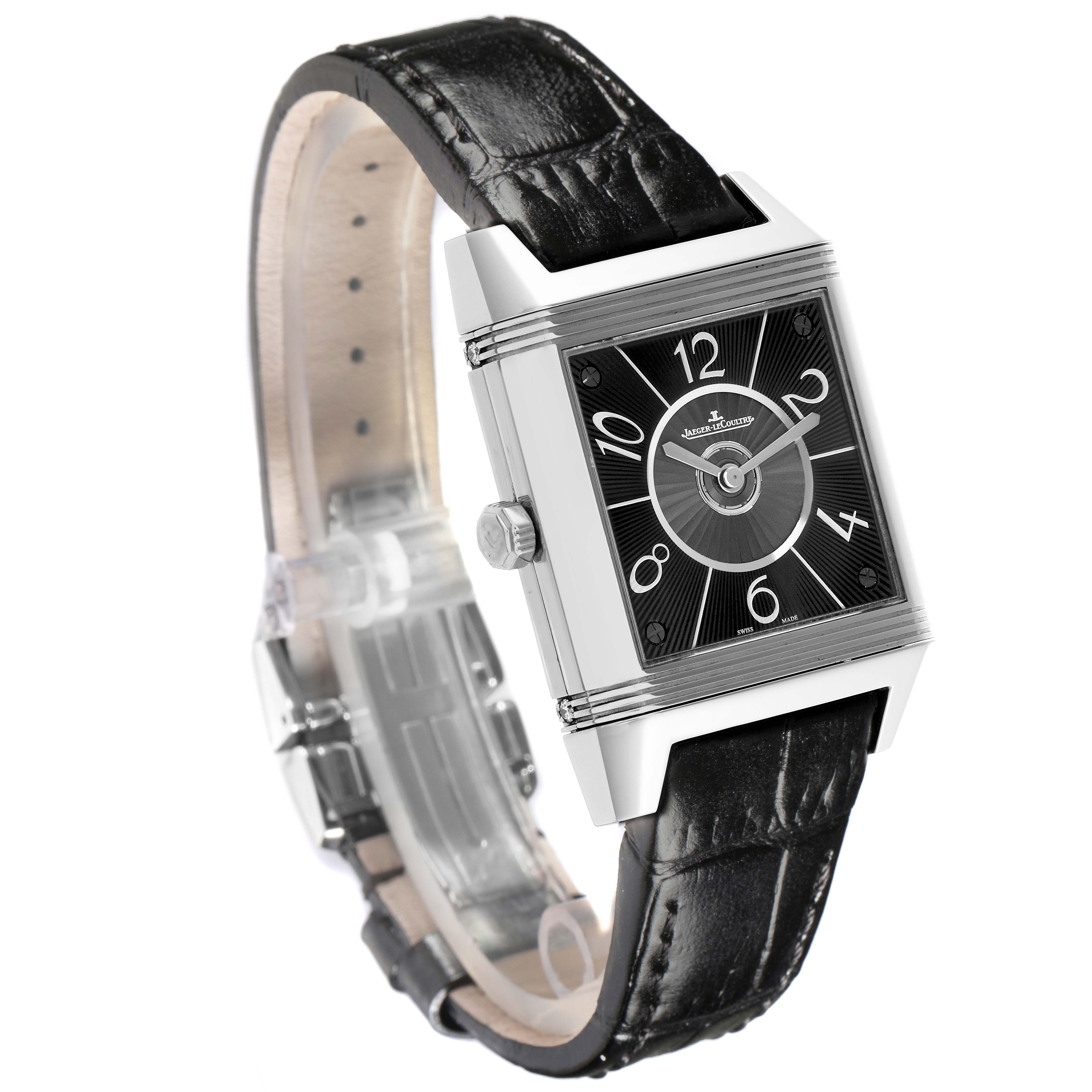 The Jaeger LeCoultre Reverso Q7058430 Women
s Stainless Steel Silver Dial Q7058430 Women
s Stainless Steel Silver Dial watch is shown at a three-quarter angle, highlighting the face, crown, and leather strap.