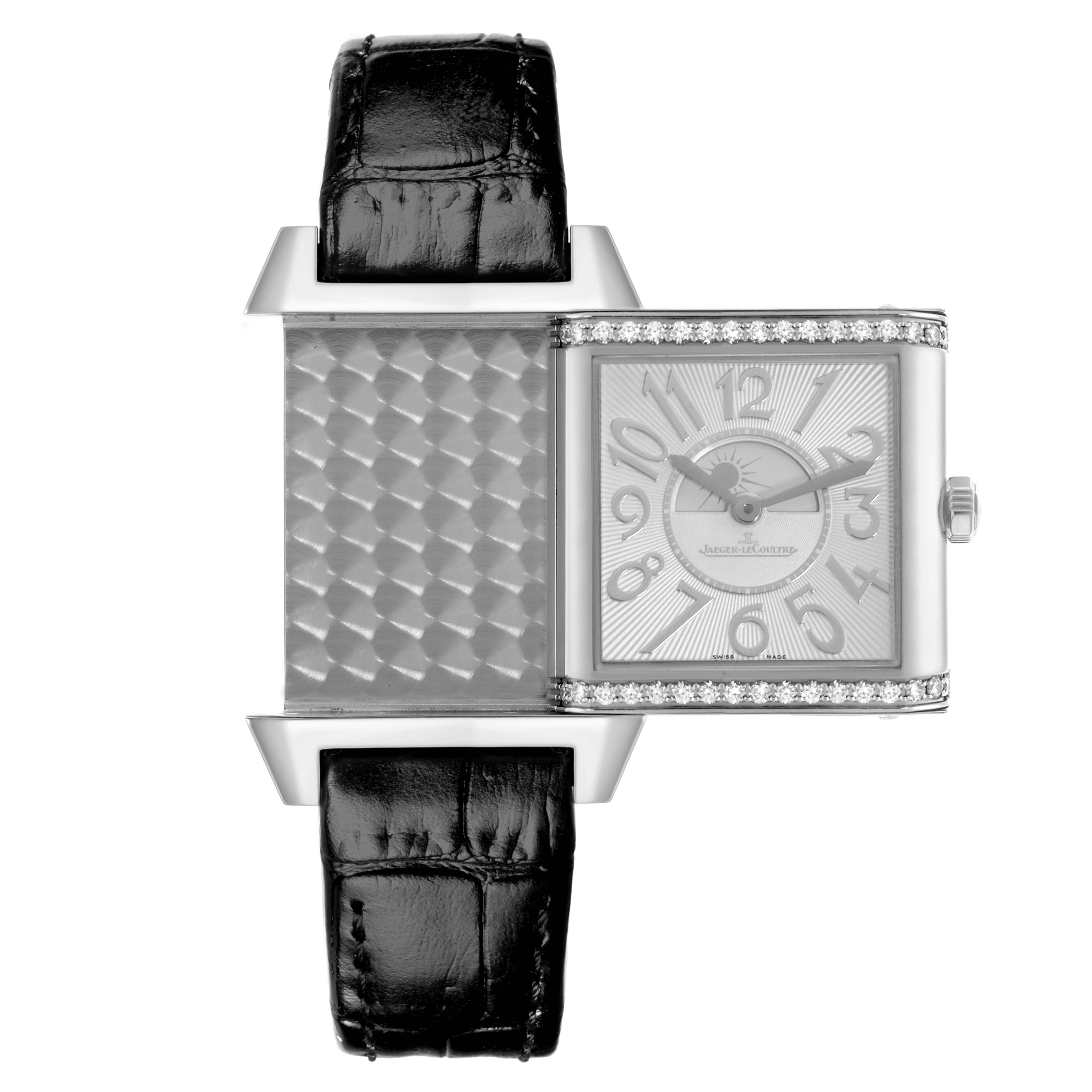 The Jaeger-LeCoultre Reverso watch is shown with its dial side and rotating case mechanism visible, along with its leather strap.