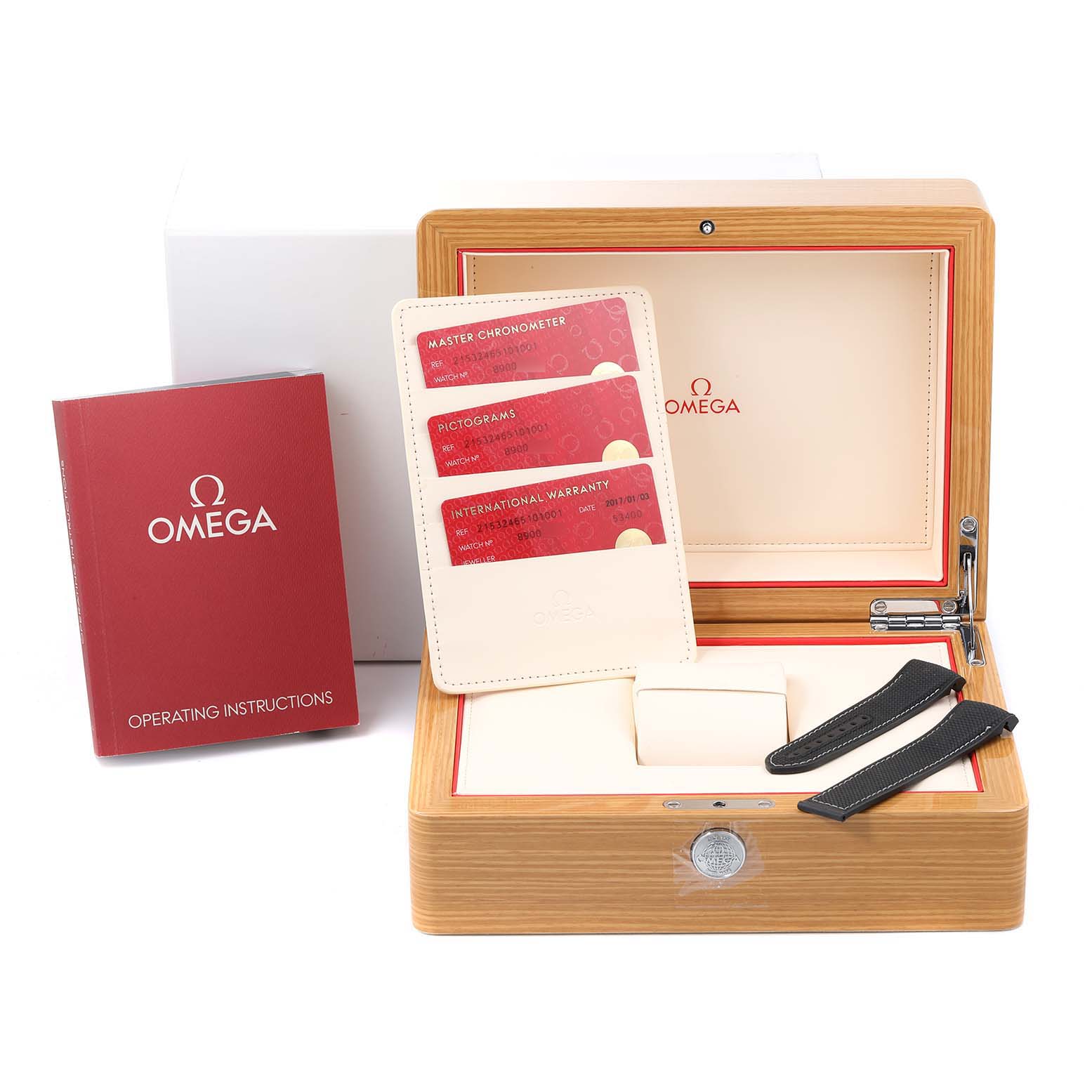 The image shows an Omega Planet Ocean 215.32.46.51.01.001 Men
s Stainless Steel Black Dial 215.32.46.51.01.001 Men
s Stainless Steel Black Dial watch box, warranty cards, operating instructions, and additional straps.