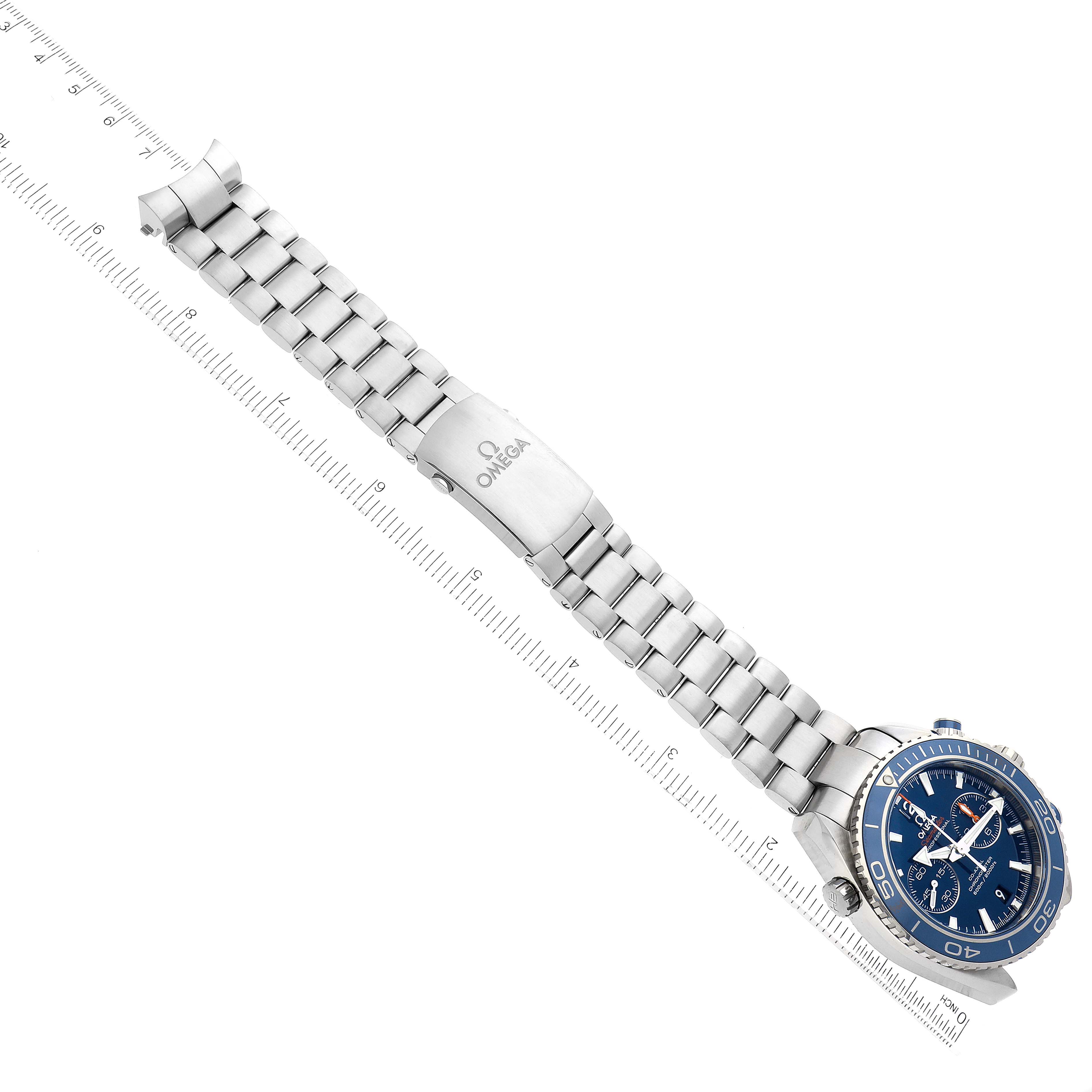 The Omega Planet Ocean 232.90.46.51.03.001 Men
s Titanium Blue Dial 232.90.46.51.03.001 Men
s Titanium Blue Dial watch is shown from an overhead angle, displaying its stainless steel bracelet and blue dial.