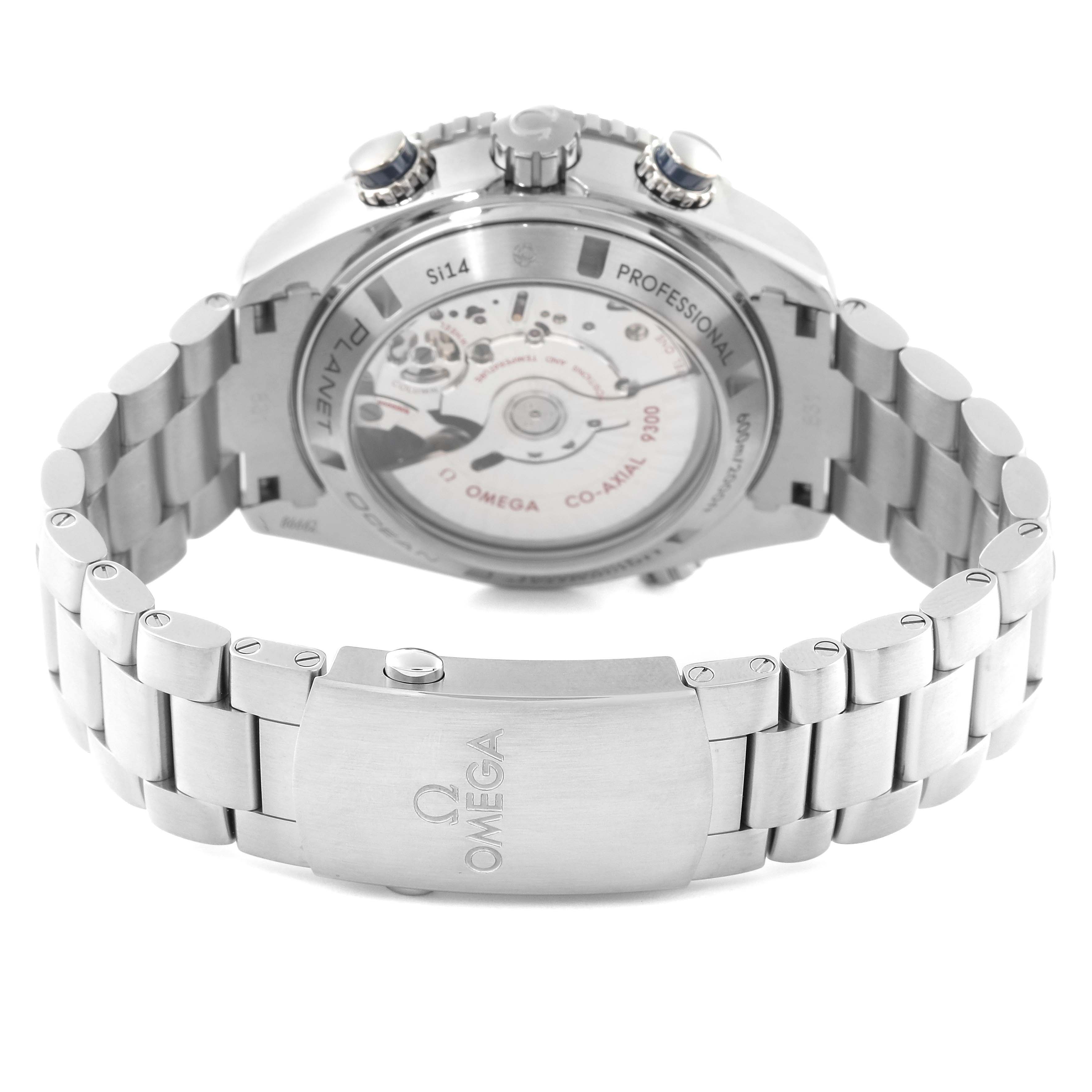 The image shows the back case and stainless steel bracelet of an Omega Planet Ocean 232.90.46.51.03.001 Men
s Titanium Blue Dial 232.90.46.51.03.001 Men
s Titanium Blue Dial watch, highlighting its movement and clasp.