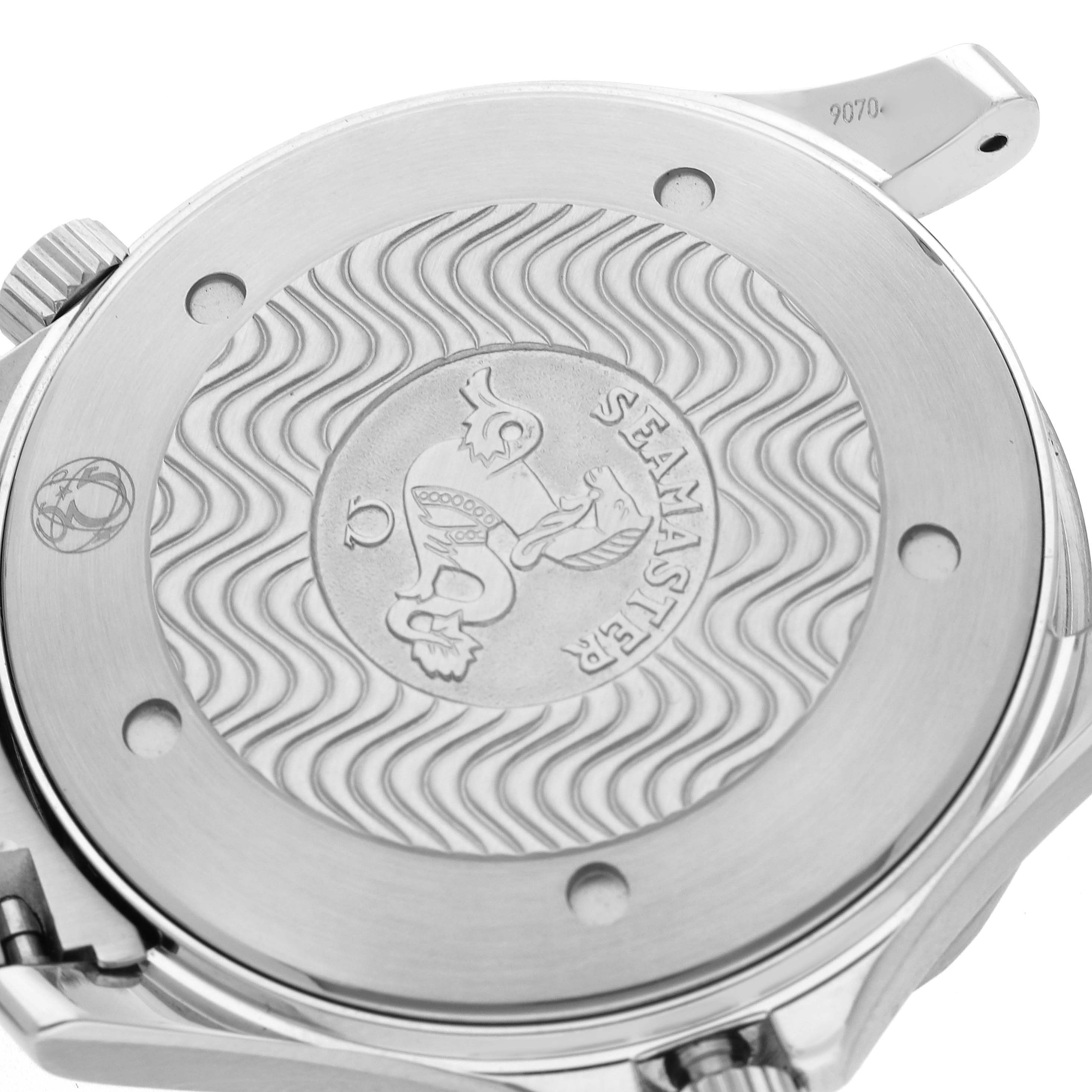 The image shows the case back of an Omega Seamaster 2264.50.00 Men
s Stainless Steel Black Dial 2264.50.00 Men
s Stainless Steel Black Dial, focusing on its engraved design and wave pattern.