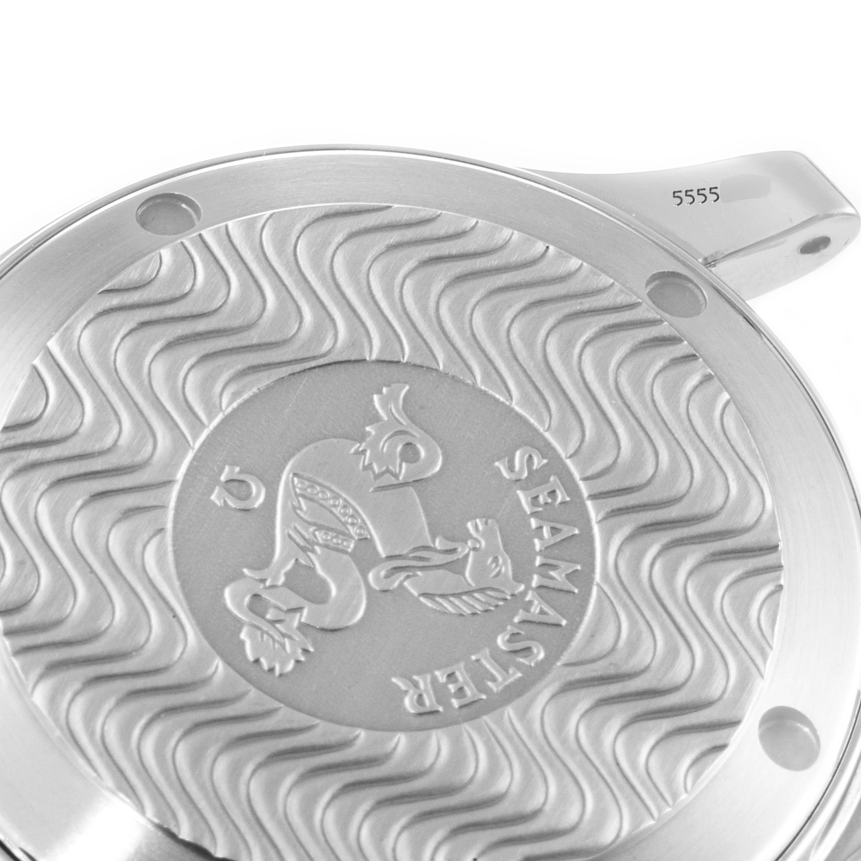 The image shows the case back of an Omega Seamaster 2561.80.00 Men's Stainless Steel Blue Dial 2561.80.00 Men's Stainless Steel Blue Dial model watch with the engraved logo and decorative patterns.