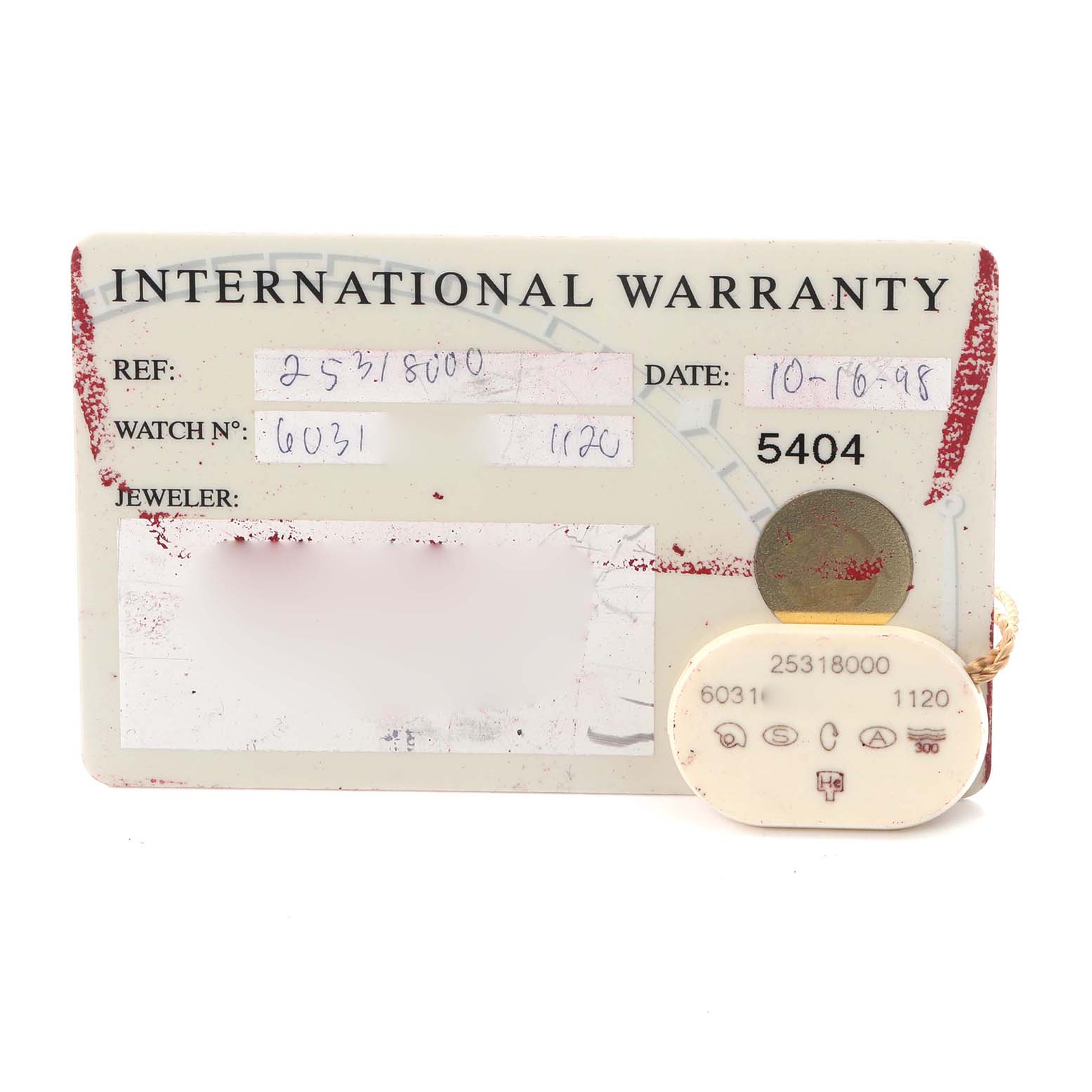 The image shows an Omega Seamaster 2531.80.00 Men
s Stainless Steel Blue Dial 2531.80.00 Men
s Stainless Steel Blue Dial warranty card alongside a tag with model and reference numbers.