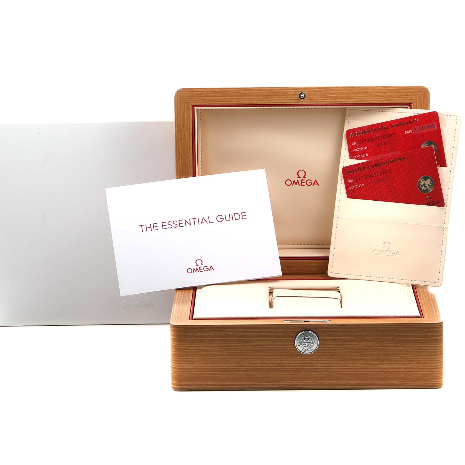 The image shows an Omega Planet Ocean 217.30.42.21.01.002 Men's Stainless Steel Black Dial watch box, warranty cards, and a guide booklet arranged from the front.