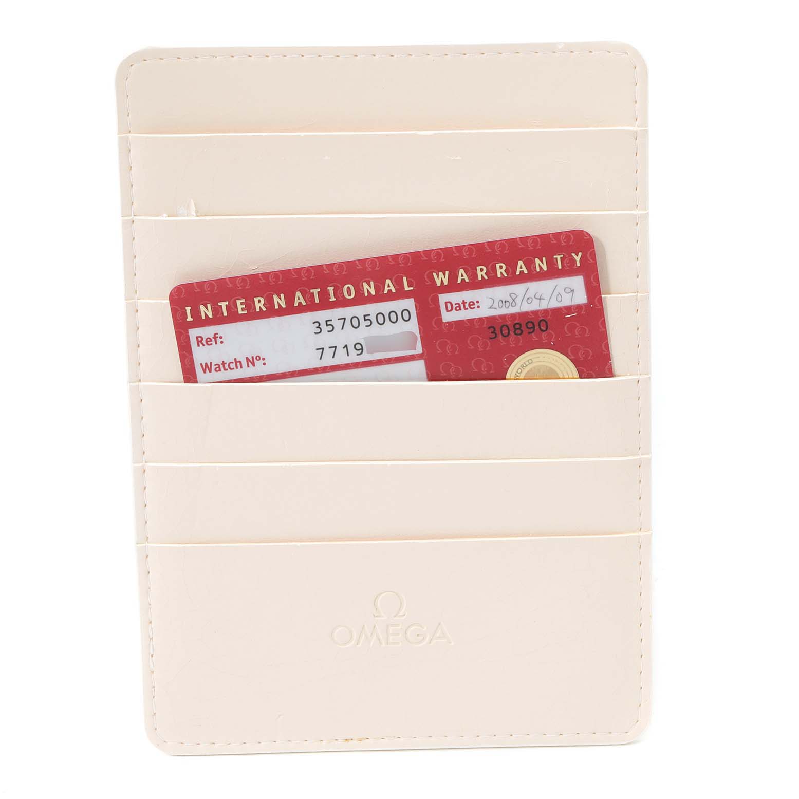 The image shows an Omega Speedmaster 3570.50.00 Men
s Stainless Steel Black Dial 3570.50.00 Men
s Stainless Steel Black Dial International Warranty card in a cream-colored cardholder.