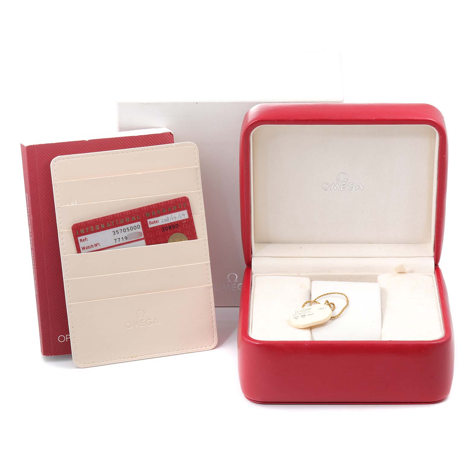 The image shows an Omega Speedmaster 3570.50.00 Men
s Stainless Steel Black Dial 3570.50.00 Men
s Stainless Steel Black Dial watch box, with certification cards and a red display case.