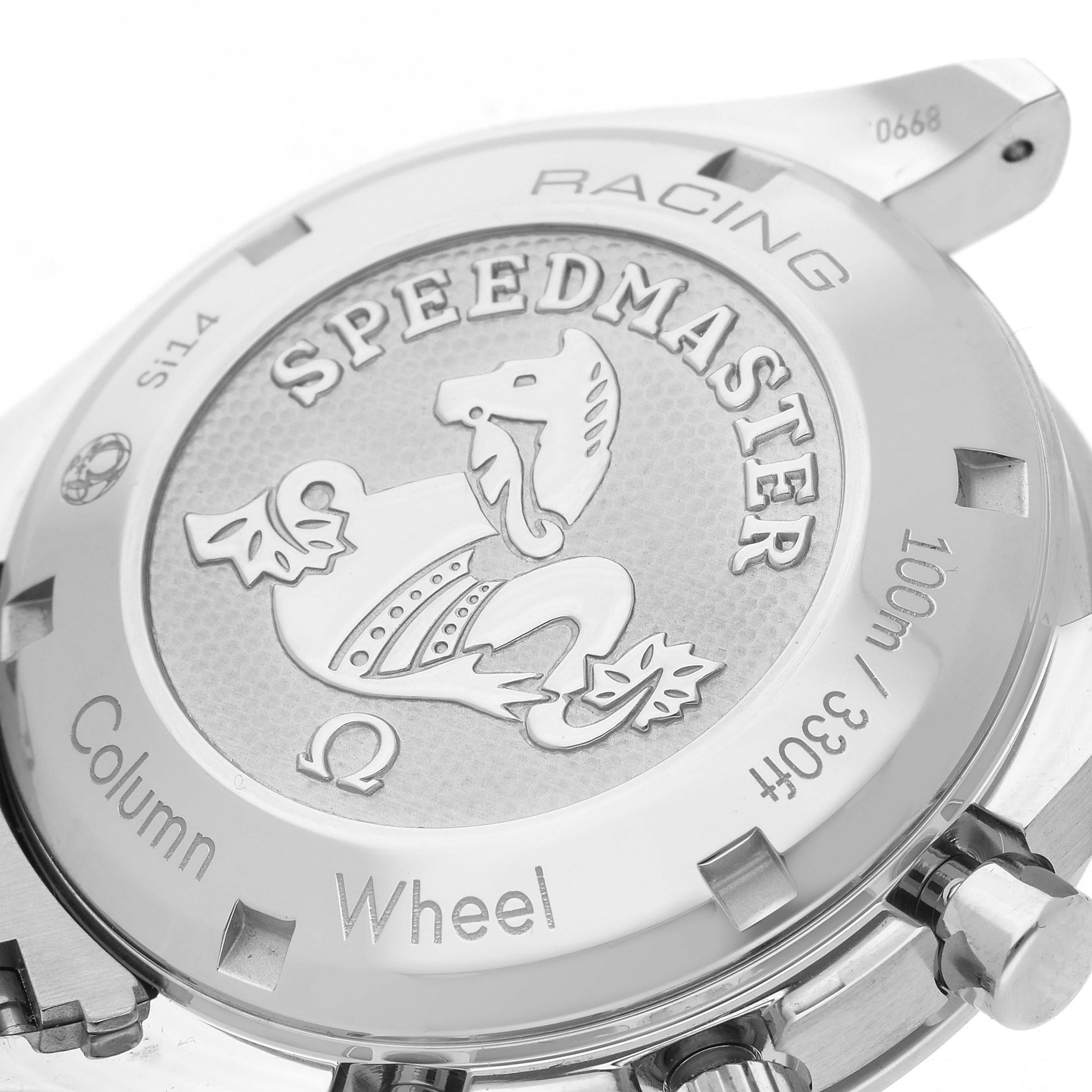 The image shows the back case of an Omega Speedmaster 326.30.40.50.02.001 Men
s Stainless Steel Silver Dial 326.30.40.50.02.001 Men
s Stainless Steel Silver Dial Racing watch, highlighting the embossed design and engravings.