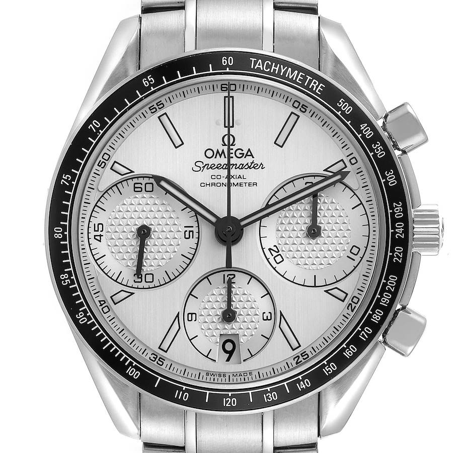 The Omega Speedmaster watch is shown from the front, highlighting the face, subdials, bezel, and part of the bracelet.