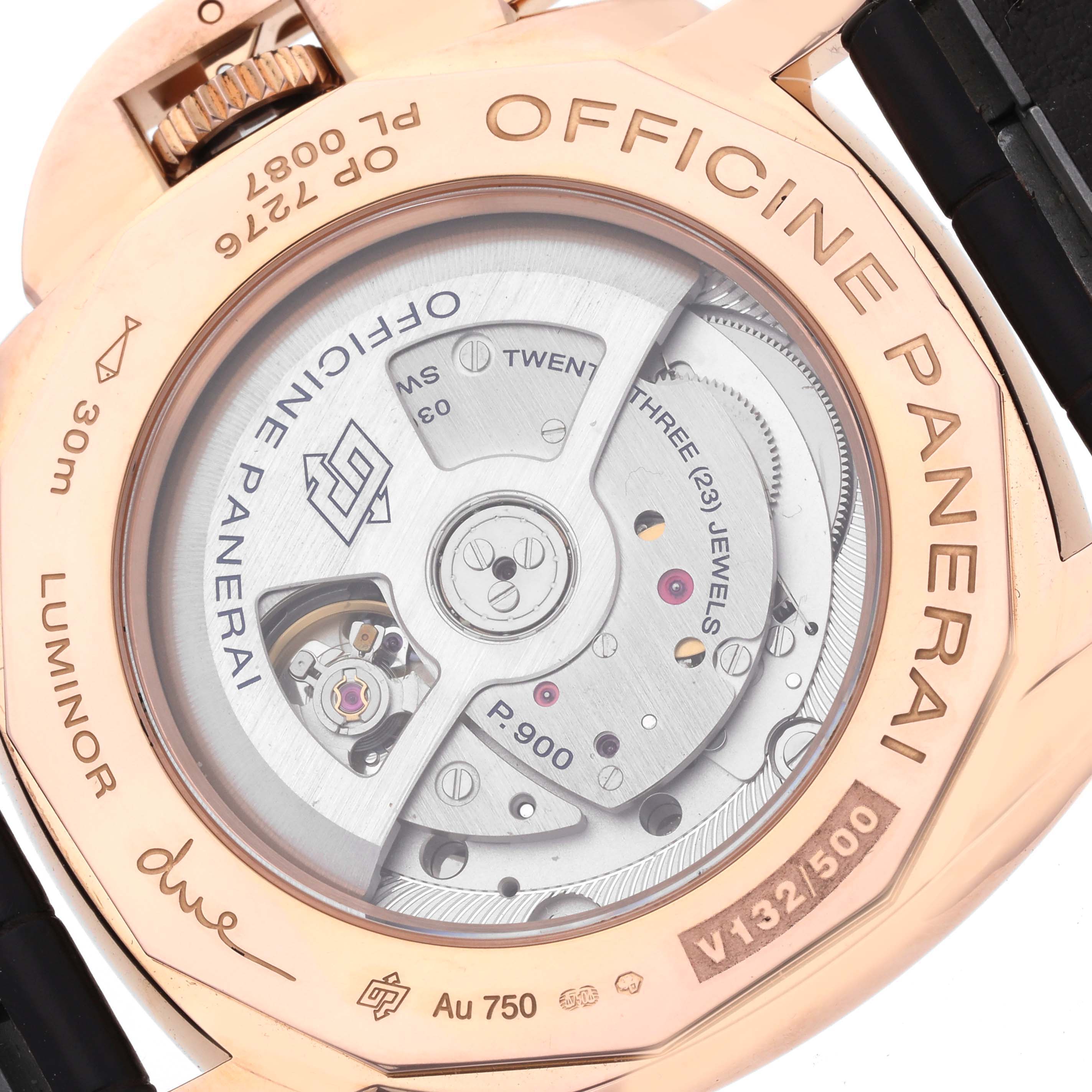 The image shows the back of a Panerai Luminor PAM01042 Men's Rose Gold White Dial watch, highlighting the movement and engravings.