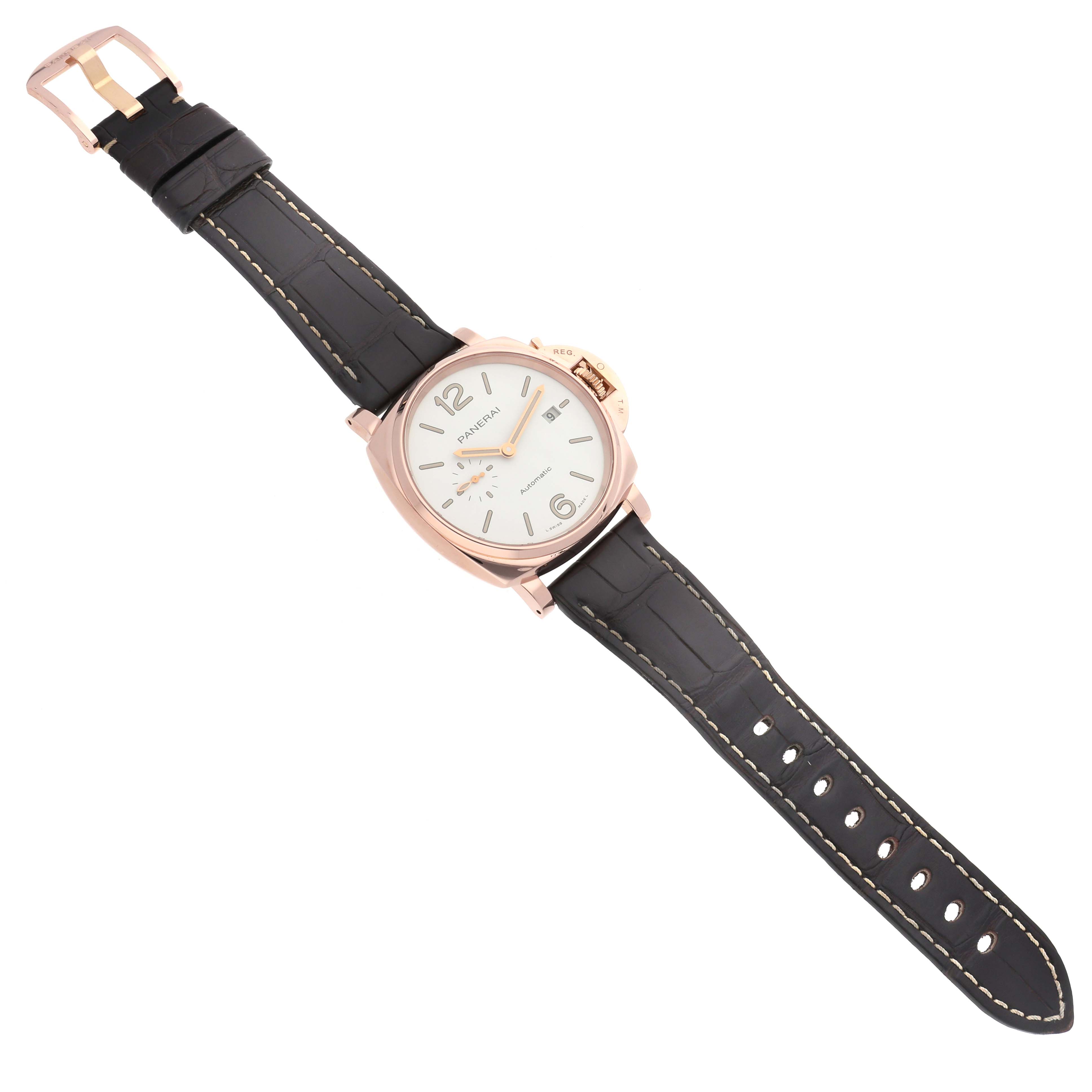 The Panerai Luminor PAM01042 Men's Rose Gold White Dial watch is shown from a top-down angle, displaying its face, case, crown guard, and leather strap.