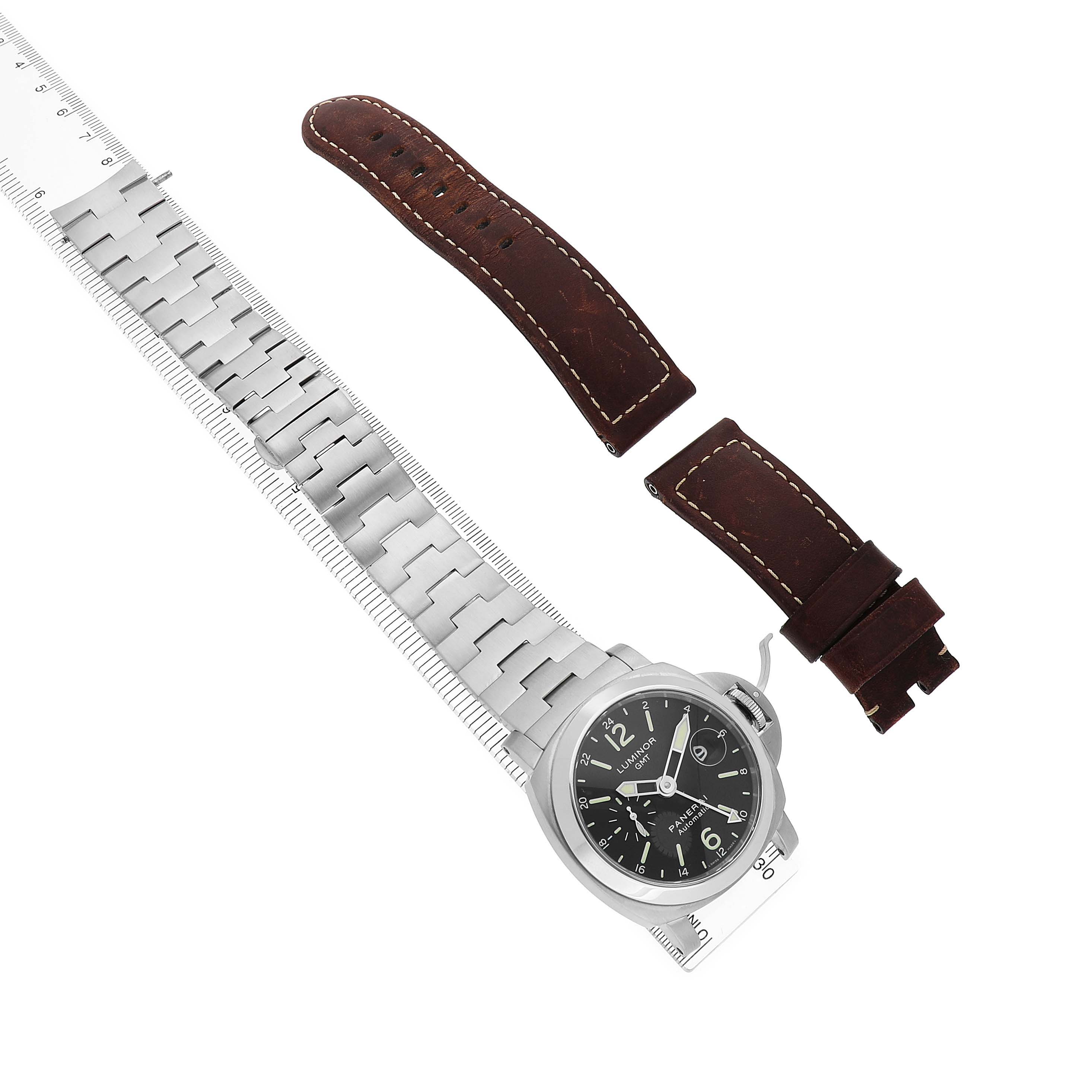 The image shows a Panerai Luminor PAM00297 Men's Stainless Steel Black Dial watch with a metal bracelet and separate leather strap sections from a top-down angle.