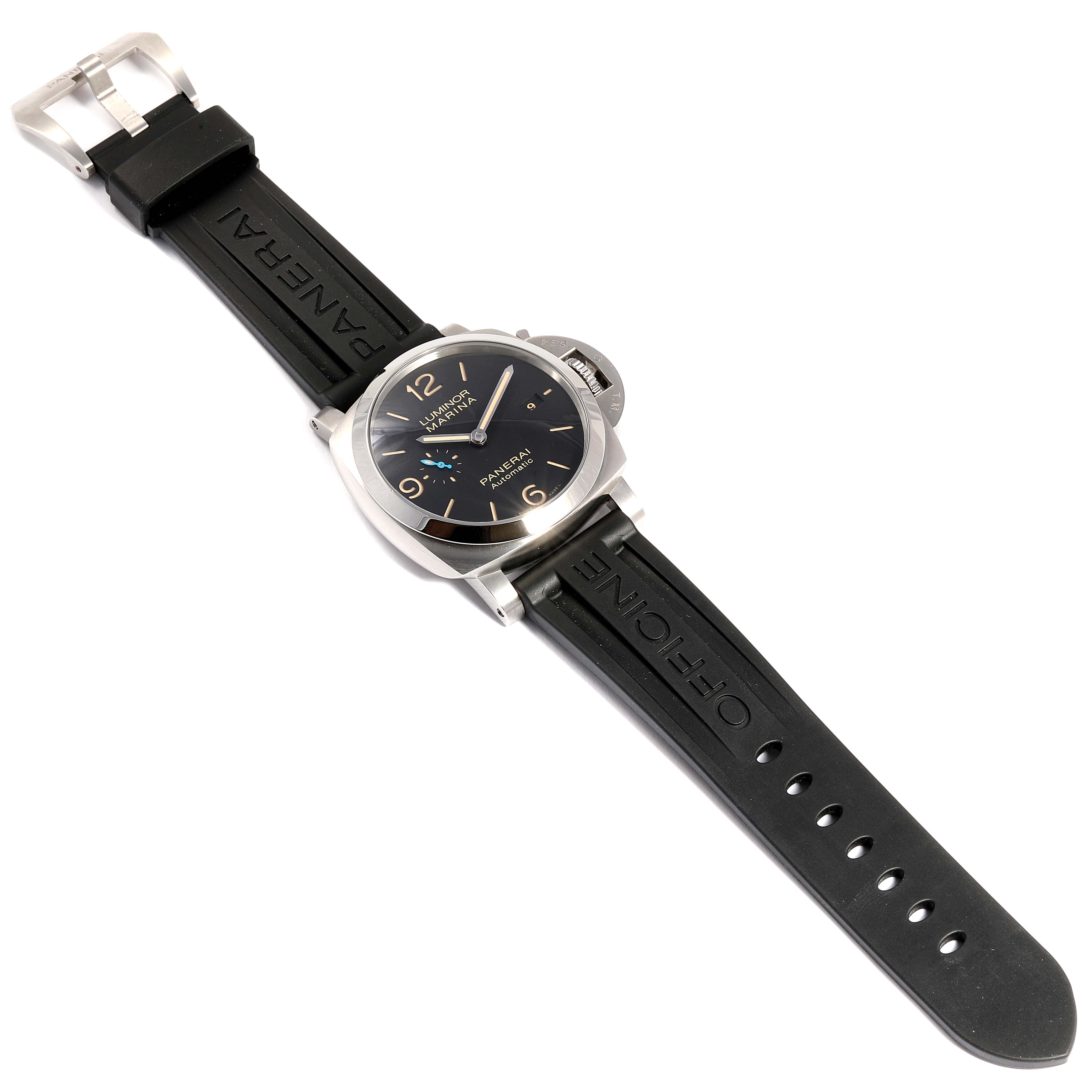 The image shows a Panerai Luminor PAM01392 Men
s Stainless Steel Black Dial PAM01392 Men
s Stainless Steel Black Dial watch at an overhead angle, highlighting the black strap, large dial, and distinctive crown guard.