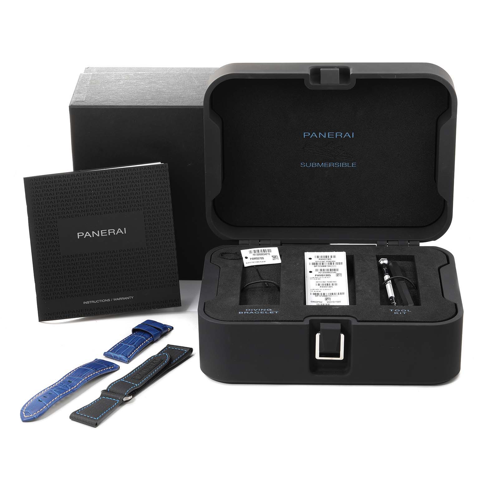 This image shows the open box of a Panerai Submersible PAM01305 Men's Titanium Black Dial PAM01305 Men's Titanium Black Dial watch, including additional straps, a tool kit, and the instruction/warranty booklet.