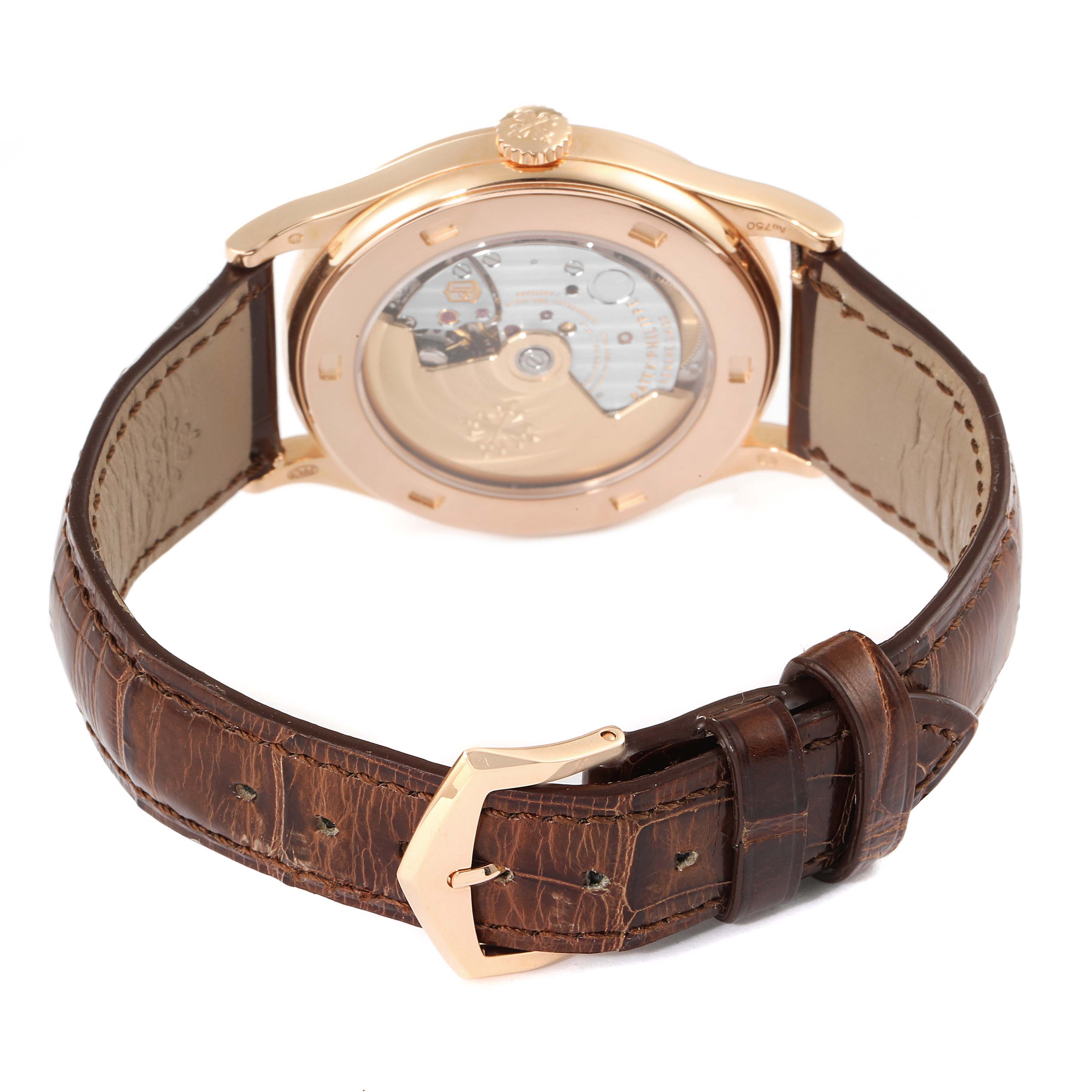 The image shows the back and strap of a Patek Philippe Calatrava 5296R-010 Men
s Rose Gold Silver Dial 5296R-010 Men
s Rose Gold Silver Dial watch, highlighting its open caseback and leather strap.
