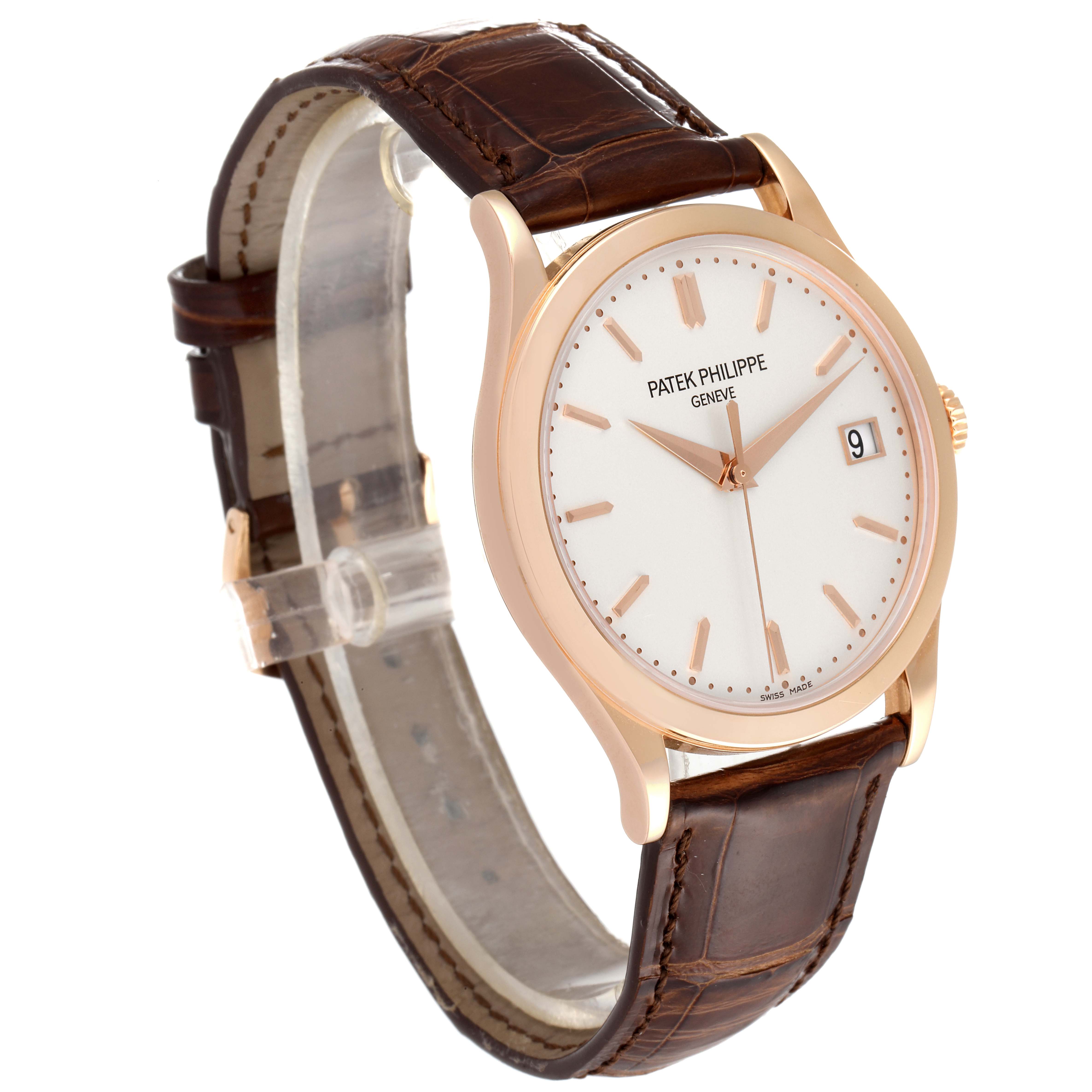 The image shows a Patek Philippe Calatrava 5296R-010 Men
s Rose Gold Silver Dial 5296R-010 Men
s Rose Gold Silver Dial watch at an angle highlighting the face, bezel, crown, and strap.