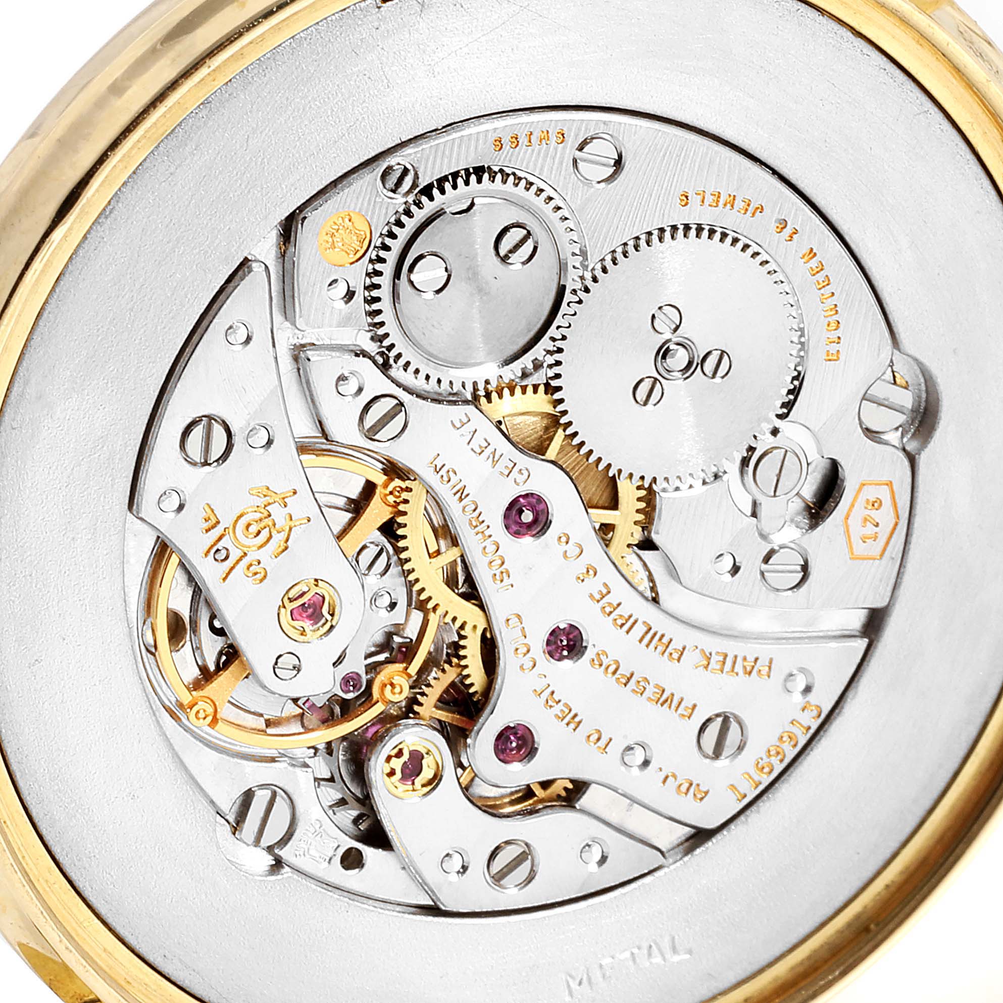 The image shows a close-up view of the Calatrava model's movement by Patek Philippe.