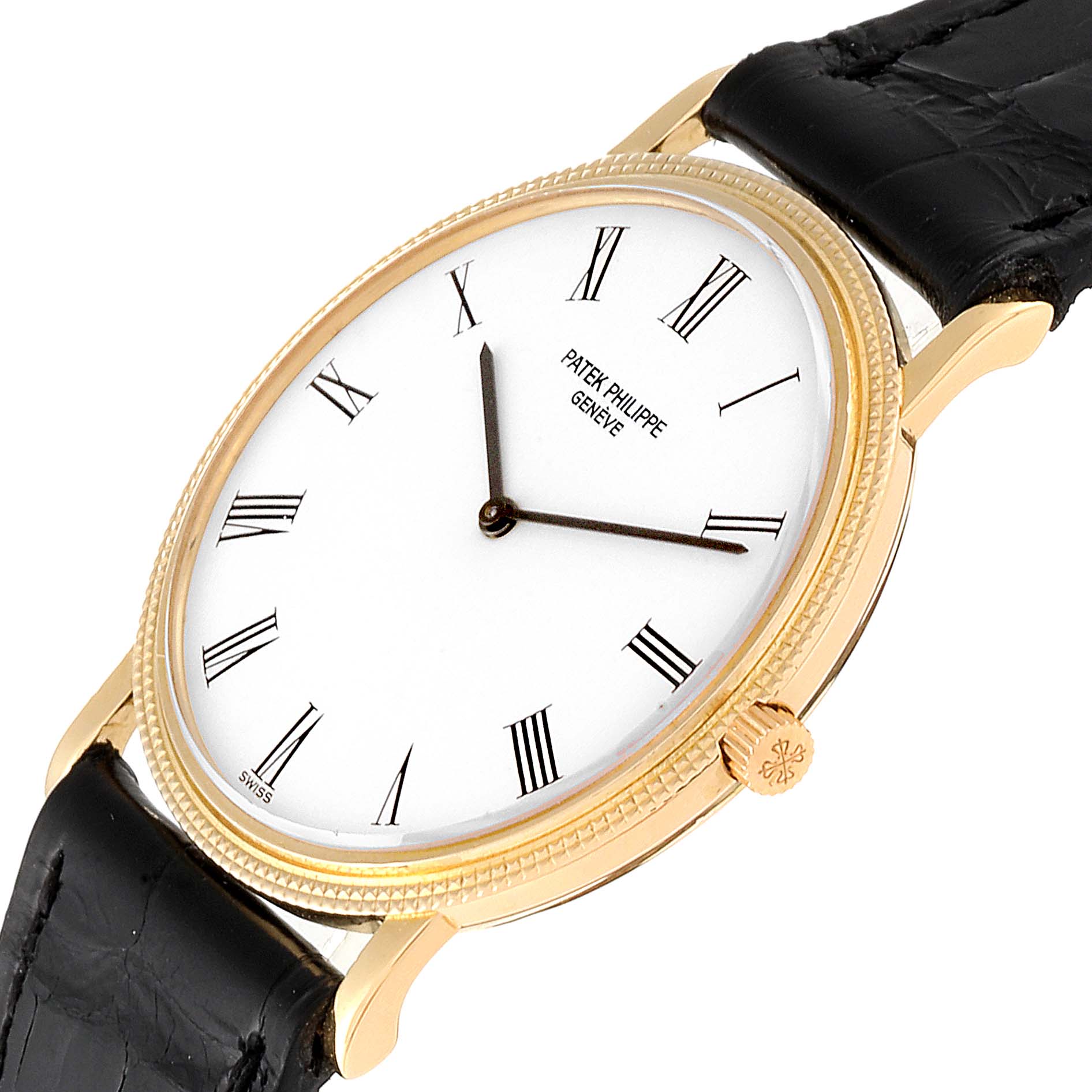 The photo shows a Patek Philippe Calatrava 3520 Men's Yellow Gold White Dial 3520 Men's Yellow Gold White Dial watch at an oblique angle, featuring its dial, hands, crown, and part of the strap.