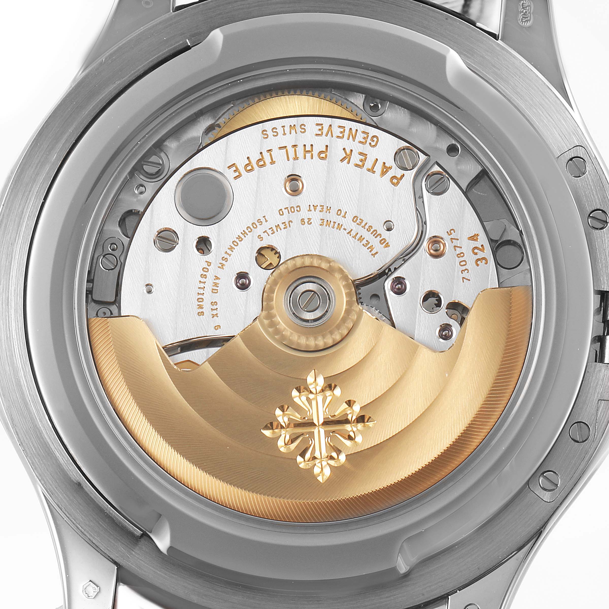 The image shows a close-up of the movement and rotor of a Patek Philippe Calatrava 5227G Men
s White Gold Black Dial 5227G Men
s White Gold Black Dial watch, viewed from the back.