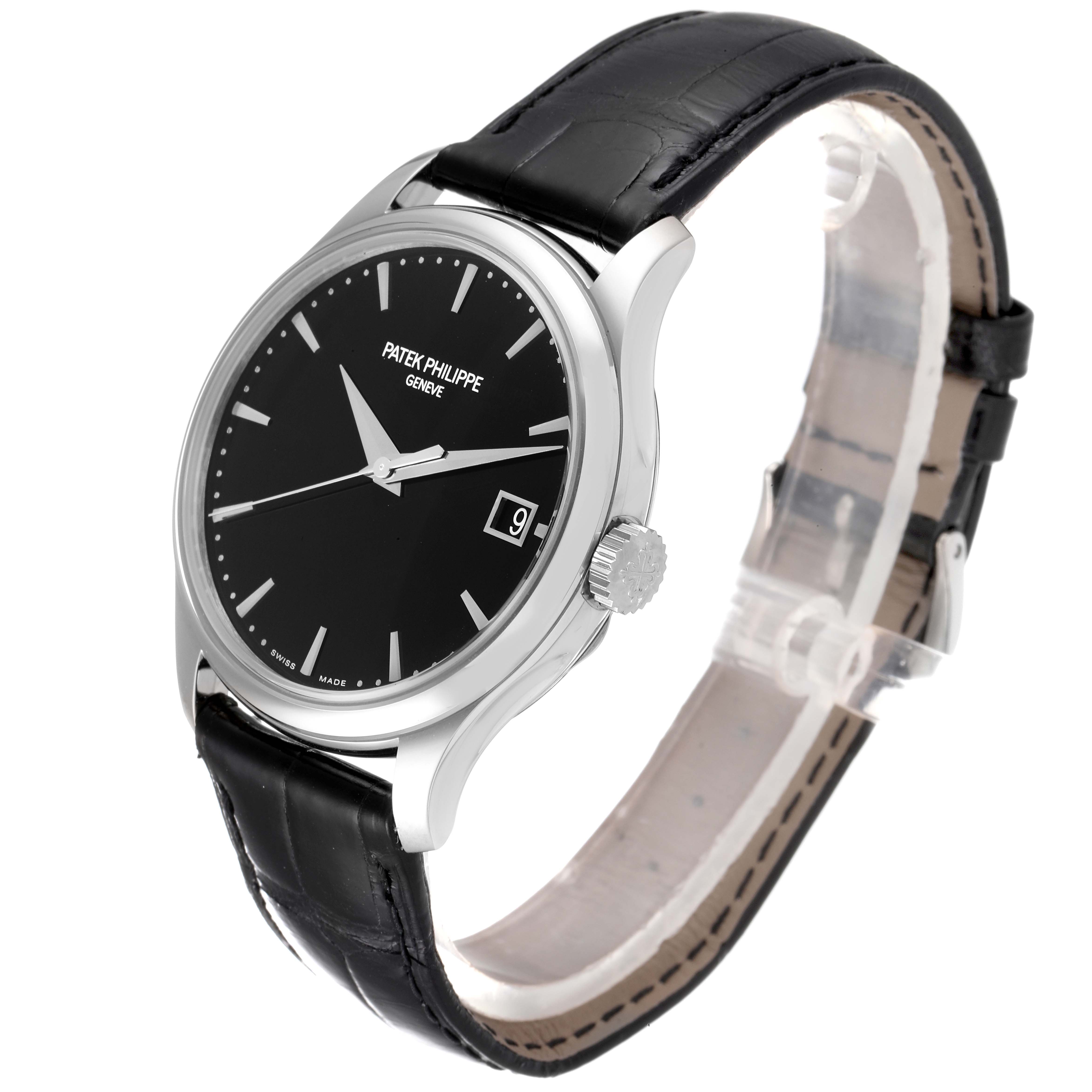 The Patek Philippe Calatrava 5227G Men
s White Gold Black Dial 5227G Men
s White Gold Black Dial watch is shown at a front-left angle, displaying the dial, crown, and leather strap.