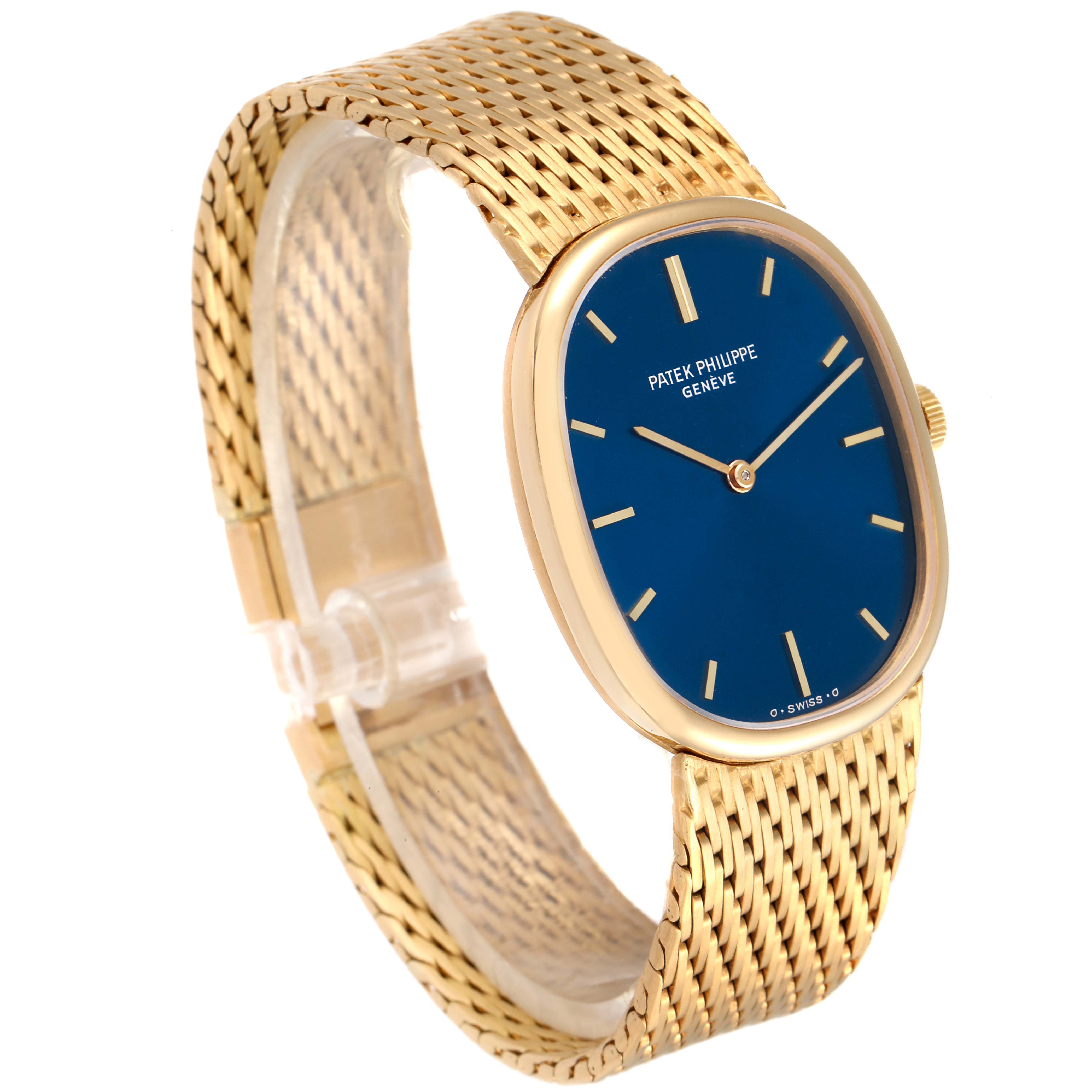 The image shows a Patek Philippe Golden Ellipse 3548 Women
s Yellow Gold Blue Dial 3548 Women
s Yellow Gold Blue Dial watch at a three-quarter angle, highlighting its blue dial and woven gold bracelet.