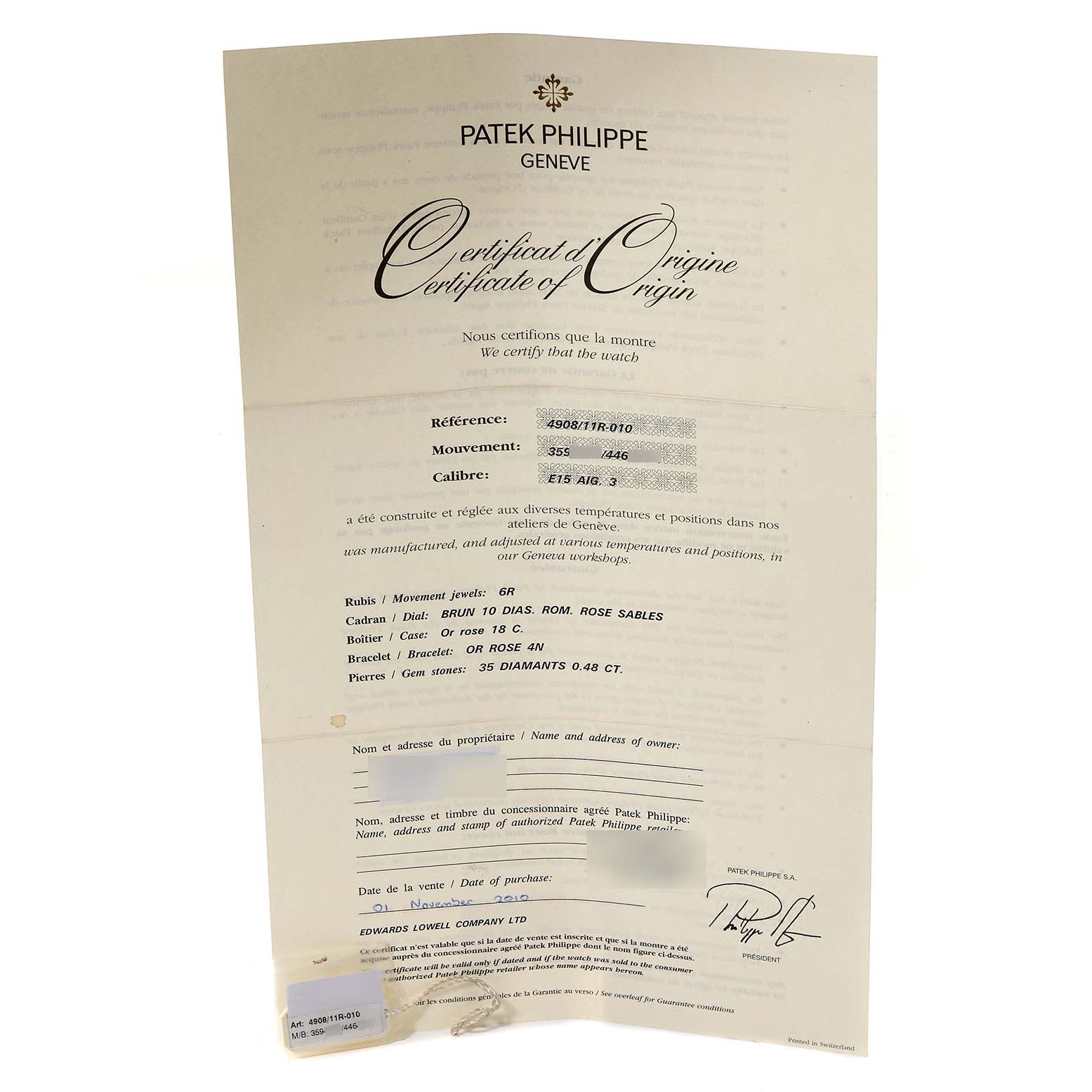 This image shows a certificate of origin for the Patek Philippe Twenty-4 4908/11R-010 Women's Rose Gold Brown Dial 4908/11R-010 Women's Rose Gold Brown Dial model, detailing its specifications and authenticity.