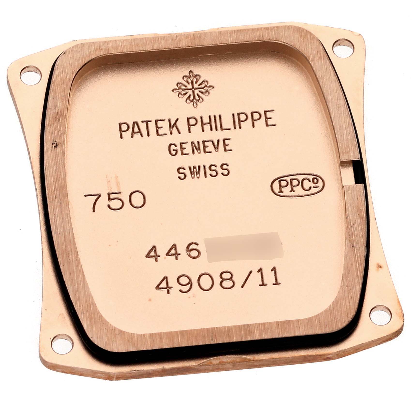 The image shows the rear case back of a Patek Philippe Twenty-4 4908/11R-010 Women's Rose Gold Brown Dial 4908/11R-010 Women's Rose Gold Brown Dial watch, displaying brand markings and model information.