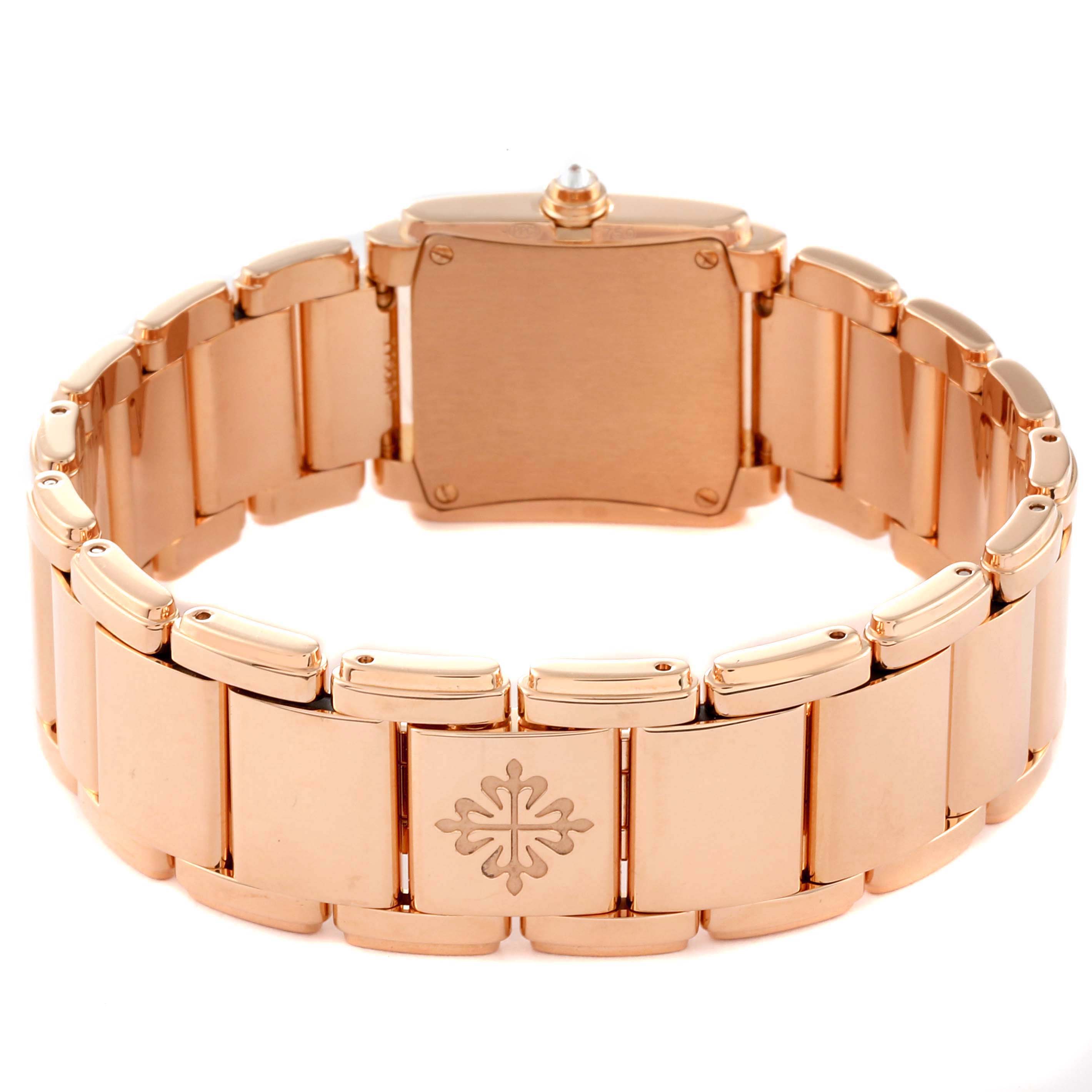 The image shows the gold bracelet and back case of a Patek Philippe Twenty-4 4908/11R-010 Women's Rose Gold Brown Dial 4908/11R-010 Women's Rose Gold Brown Dial model watch, viewed from the rear angle.