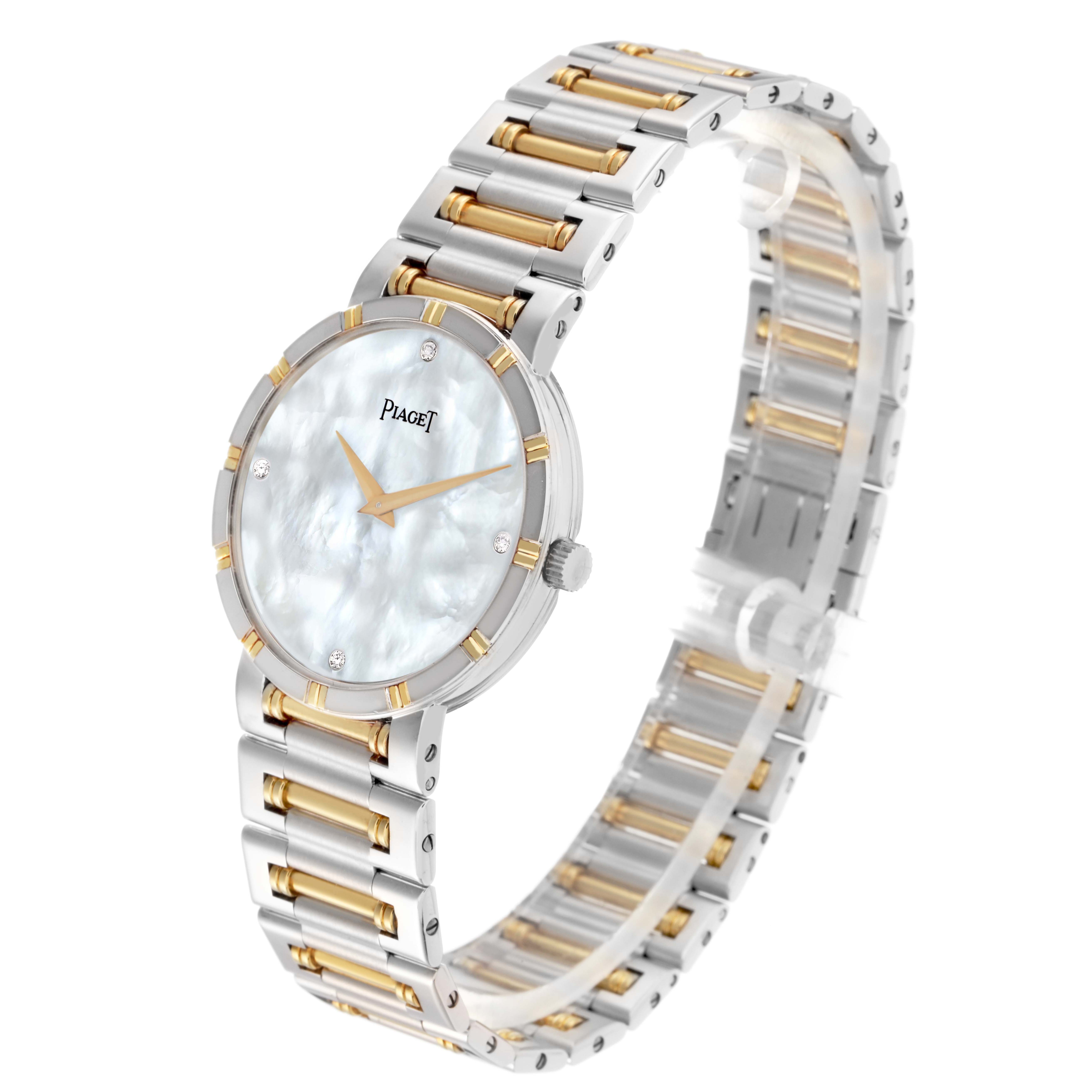 The Piaget 94023K81 Women
s Steel and Gold (two tone) Mother of Pearl Dial Dancer Midsize is shown at an oblique angle, highlighting its steel and yellow gold bracelet, MOP dial, and diamond markers.