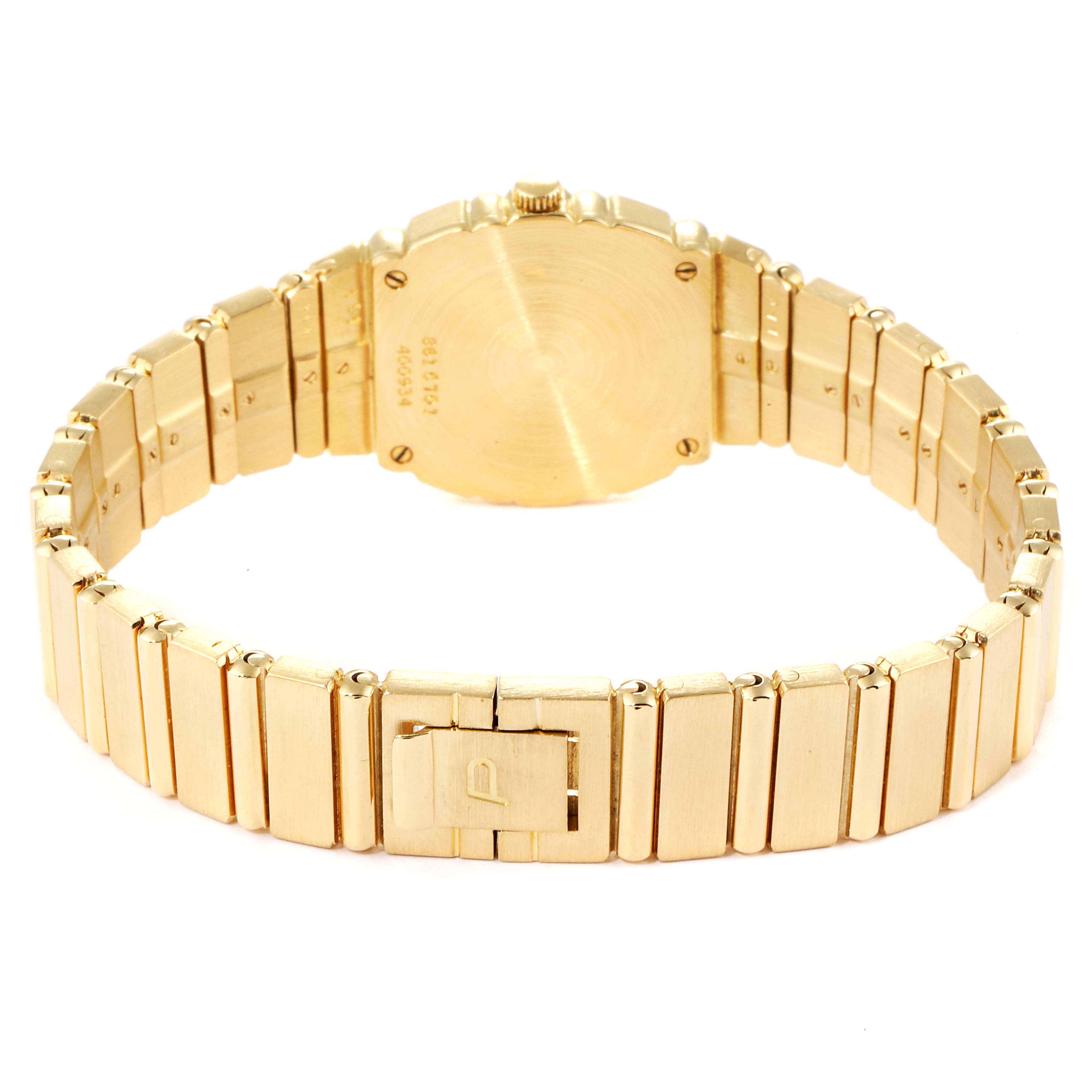 The image shows the back view of a Piaget 861 C701 Women's Yellow Gold Champagne Dial 861 C701 Women's Yellow Gold Champagne Dial Polo 18K Yellow Gold Champagne Dial Quartz Ladies Watch C701, highlighting its case back and bracelet.